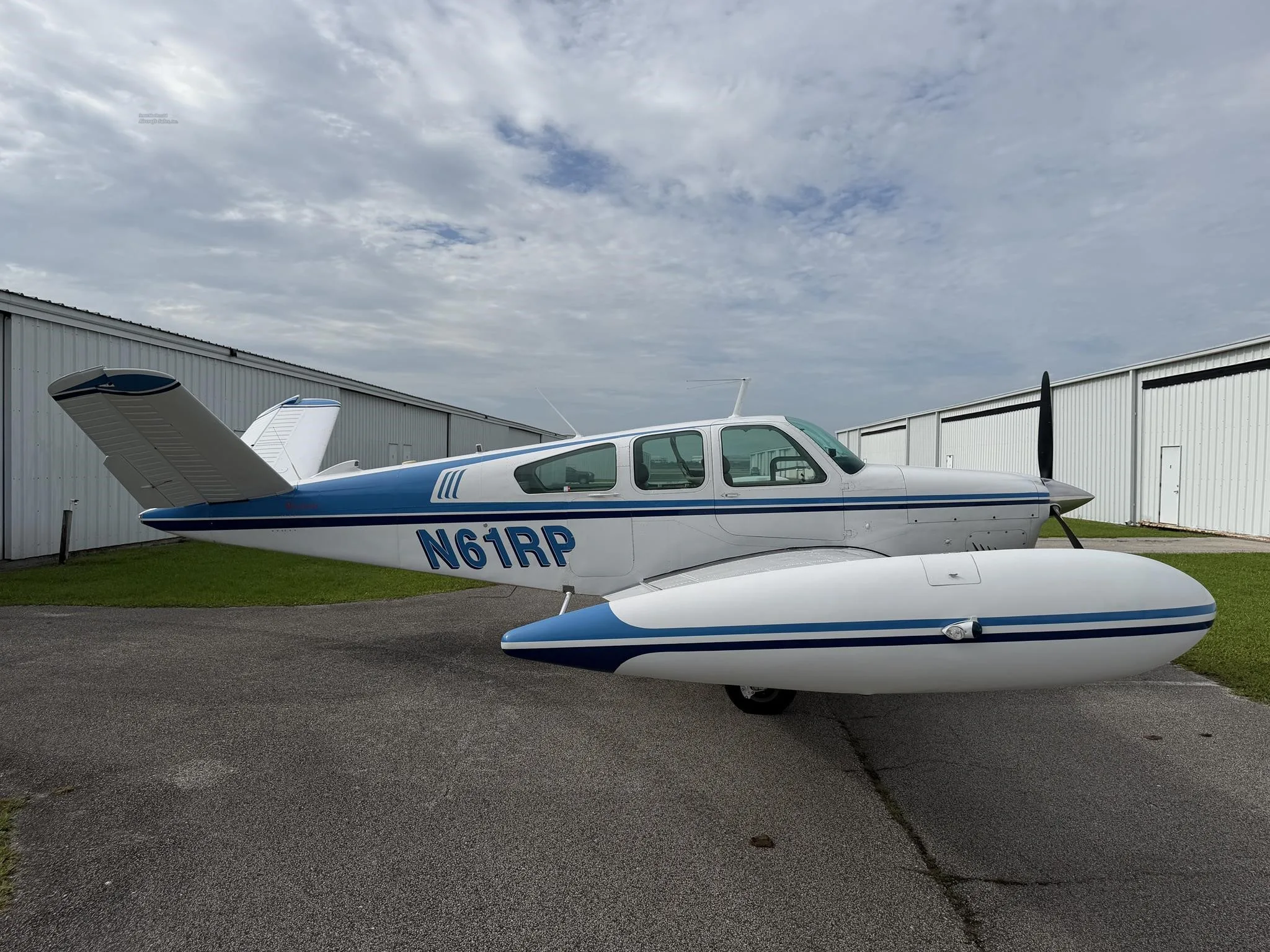 Exterior view of a 1962 BEECHCRAFT P35 BONANZA, N61RP.