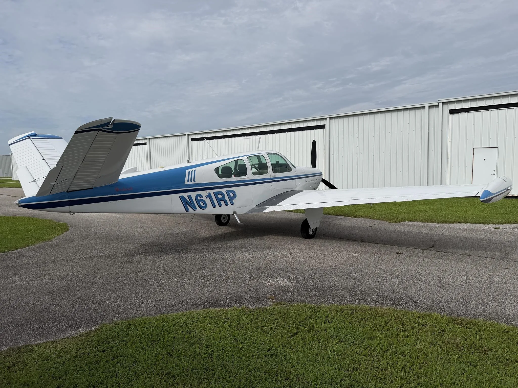 Exterior view of a 1962 BEECHCRAFT P35 BONANZA, N61RP.