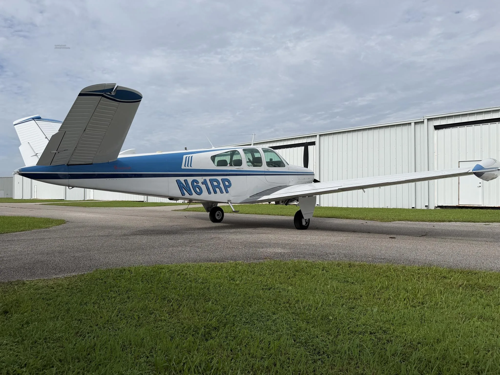 Exterior view of a 1962 BEECHCRAFT P35 BONANZA, N61RP.