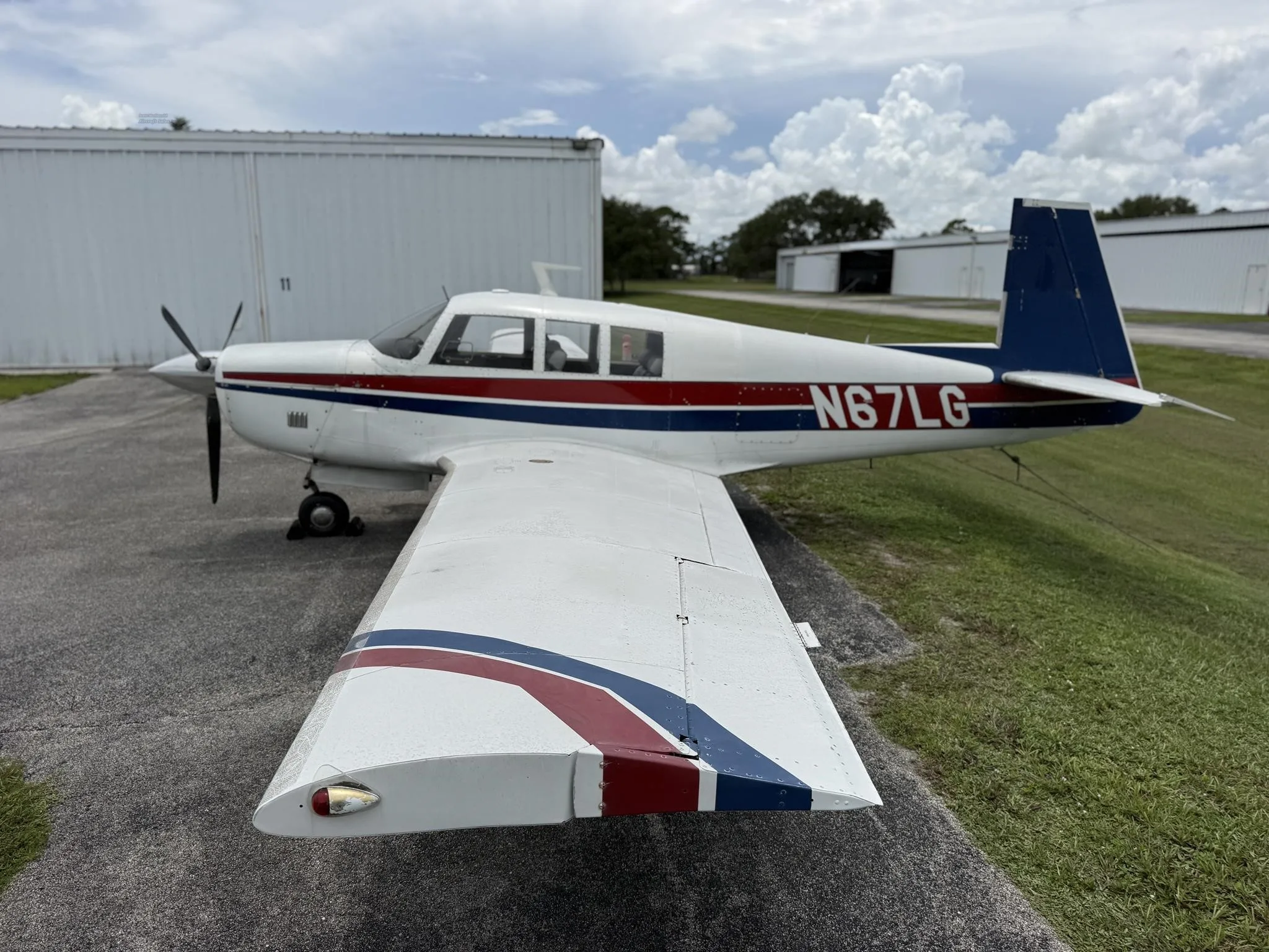Exterior view of a 1967 MOONEY M20F, N62LG.