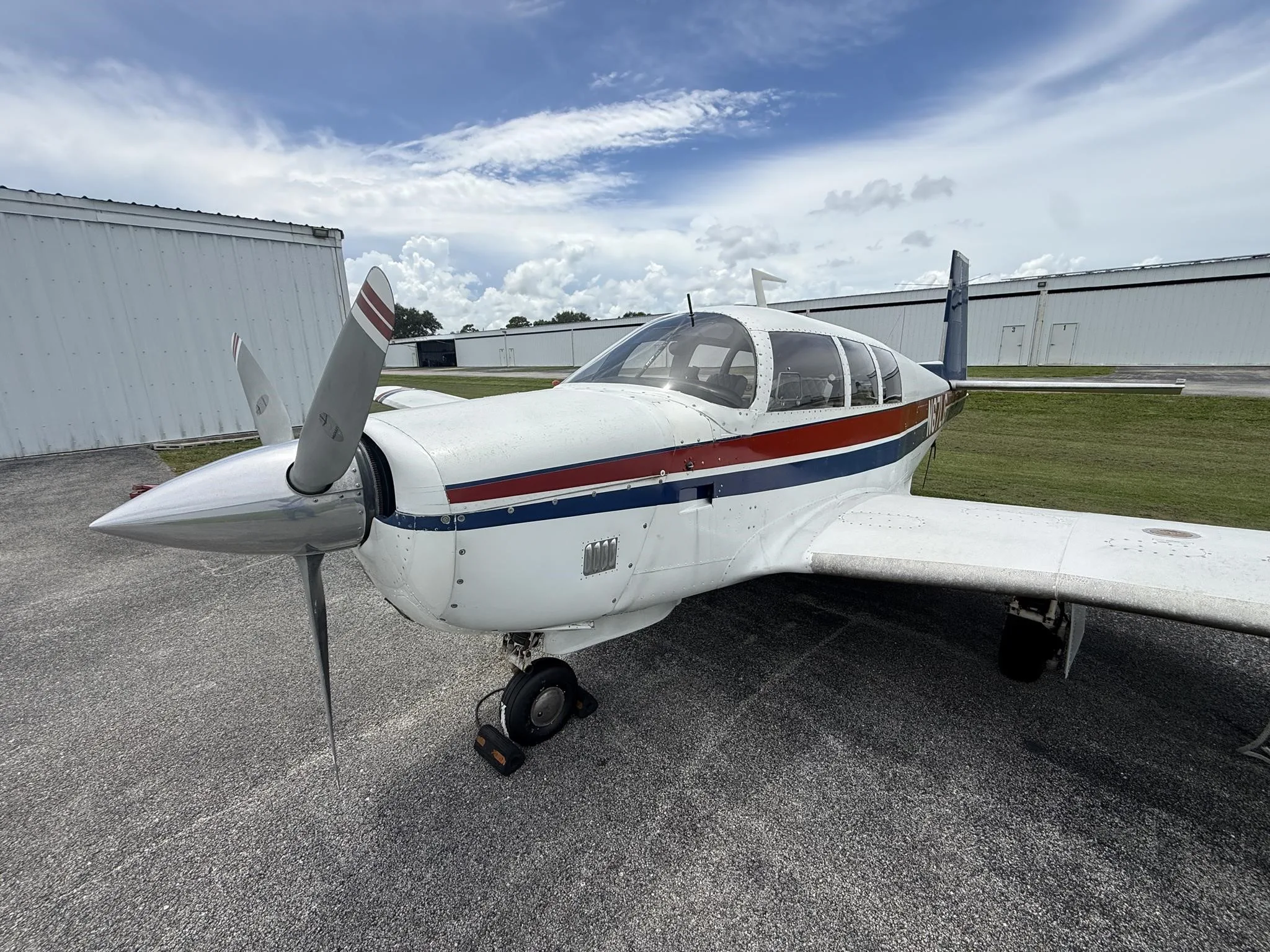 Exterior view of a 1967 MOONEY M20F, N62LG.