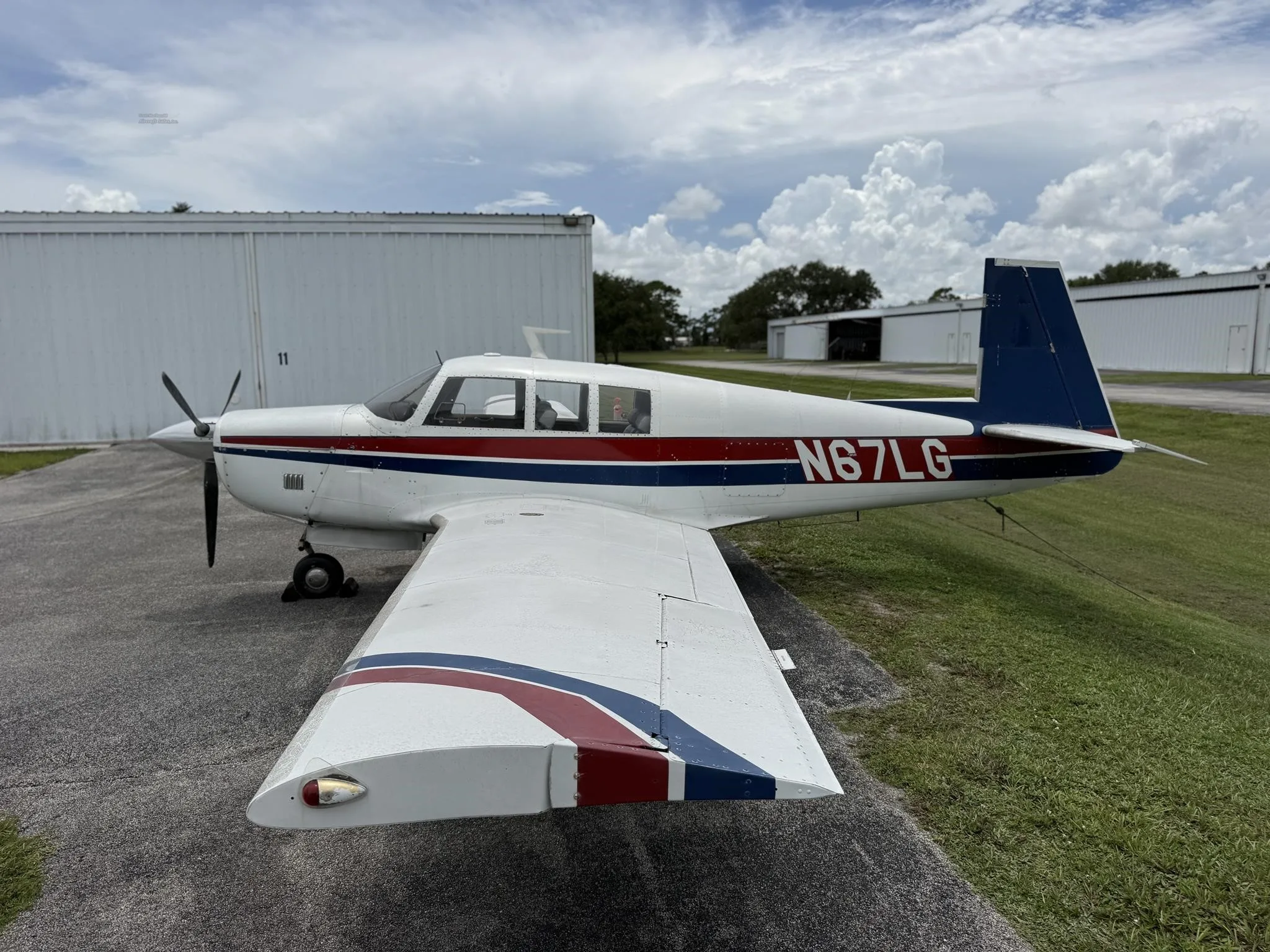 Exterior view of a 1967 MOONEY M20F, N62LG.