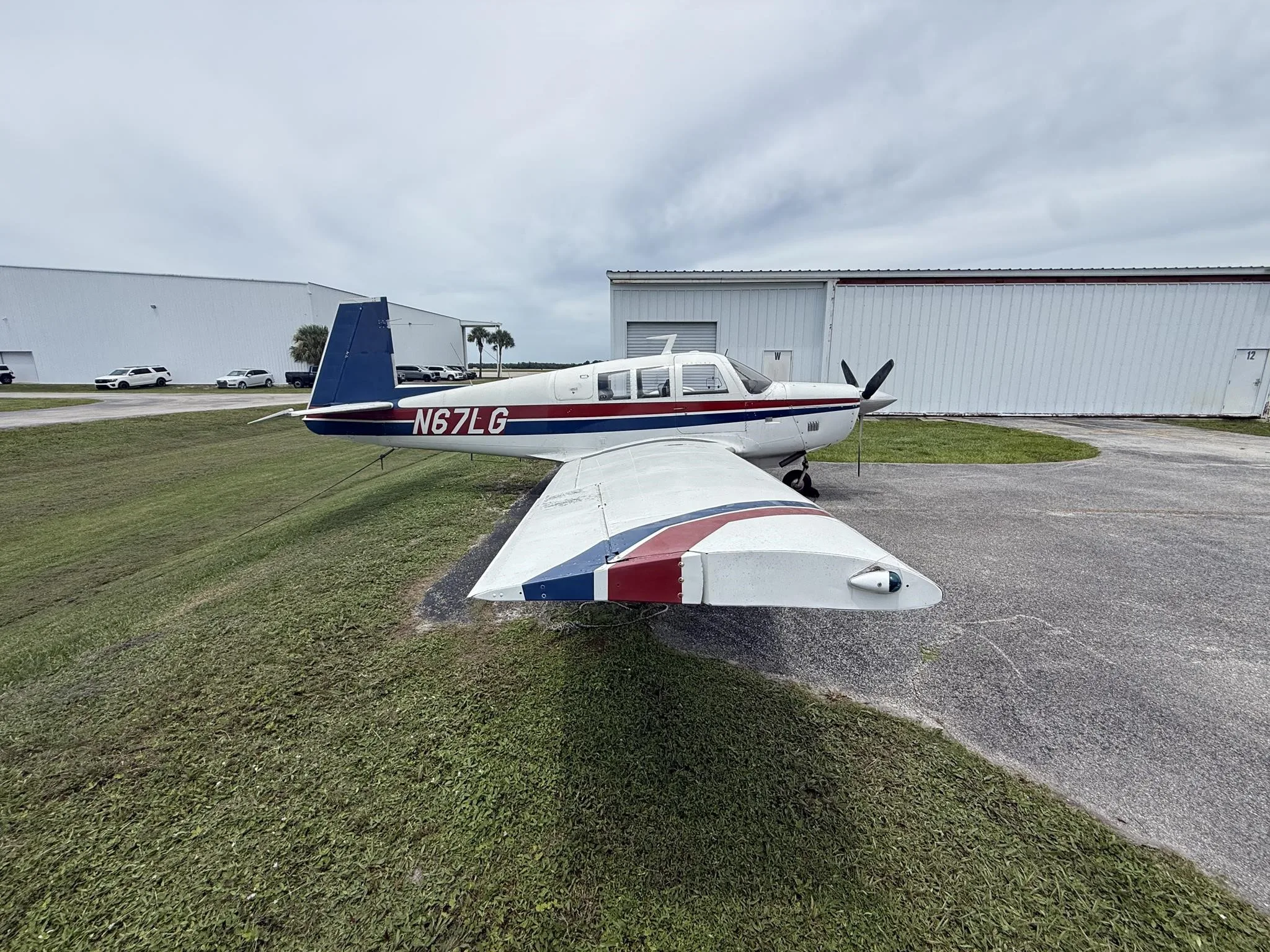 Exterior view of a 1967 MOONEY M20F, N62LG.