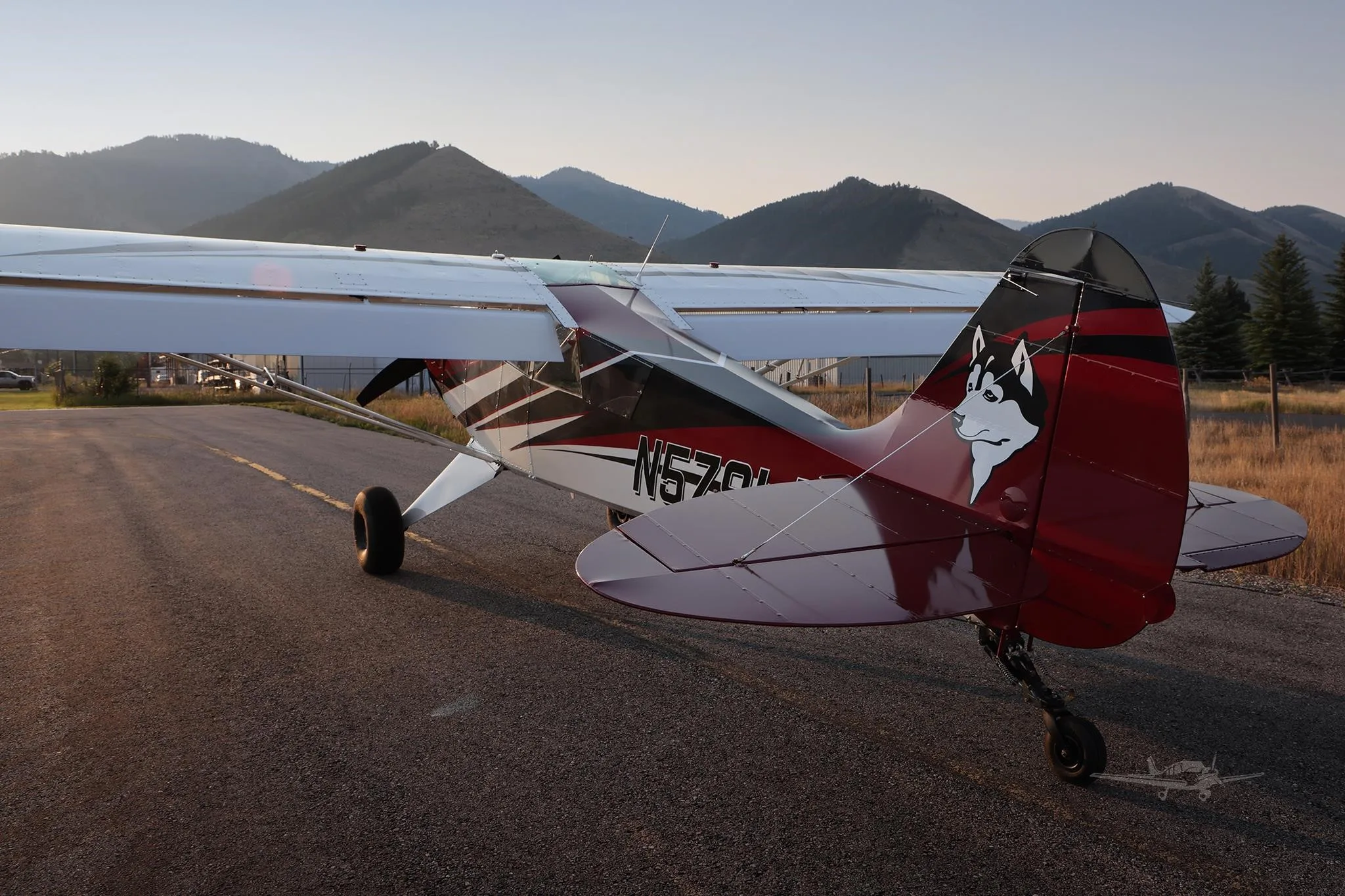 Exterior view of a 2025 AVIAT HUSKY A-1C-200, N579LM.