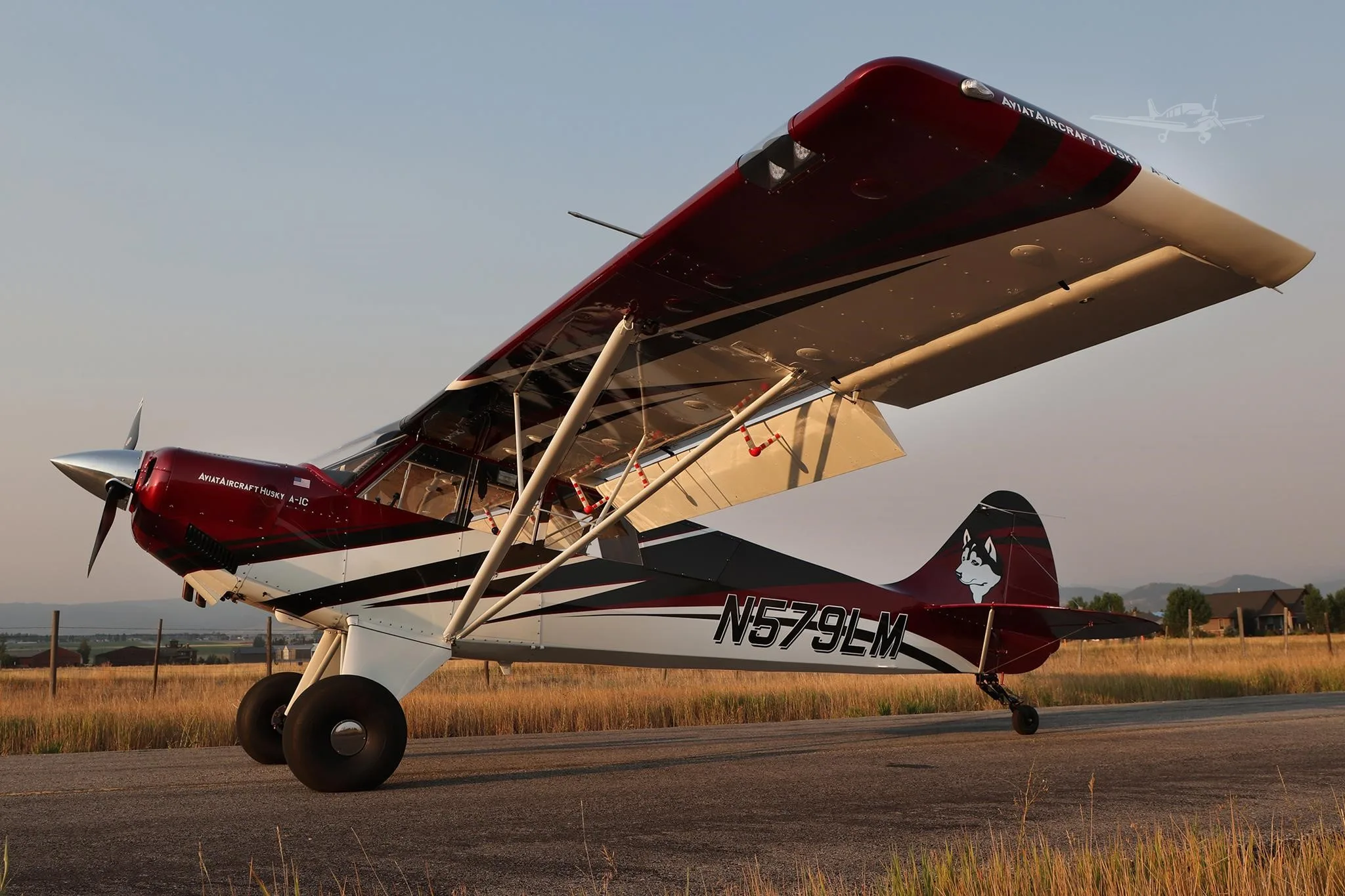 Exterior view of a 2025 AVIAT HUSKY A-1C-200, N579LM.