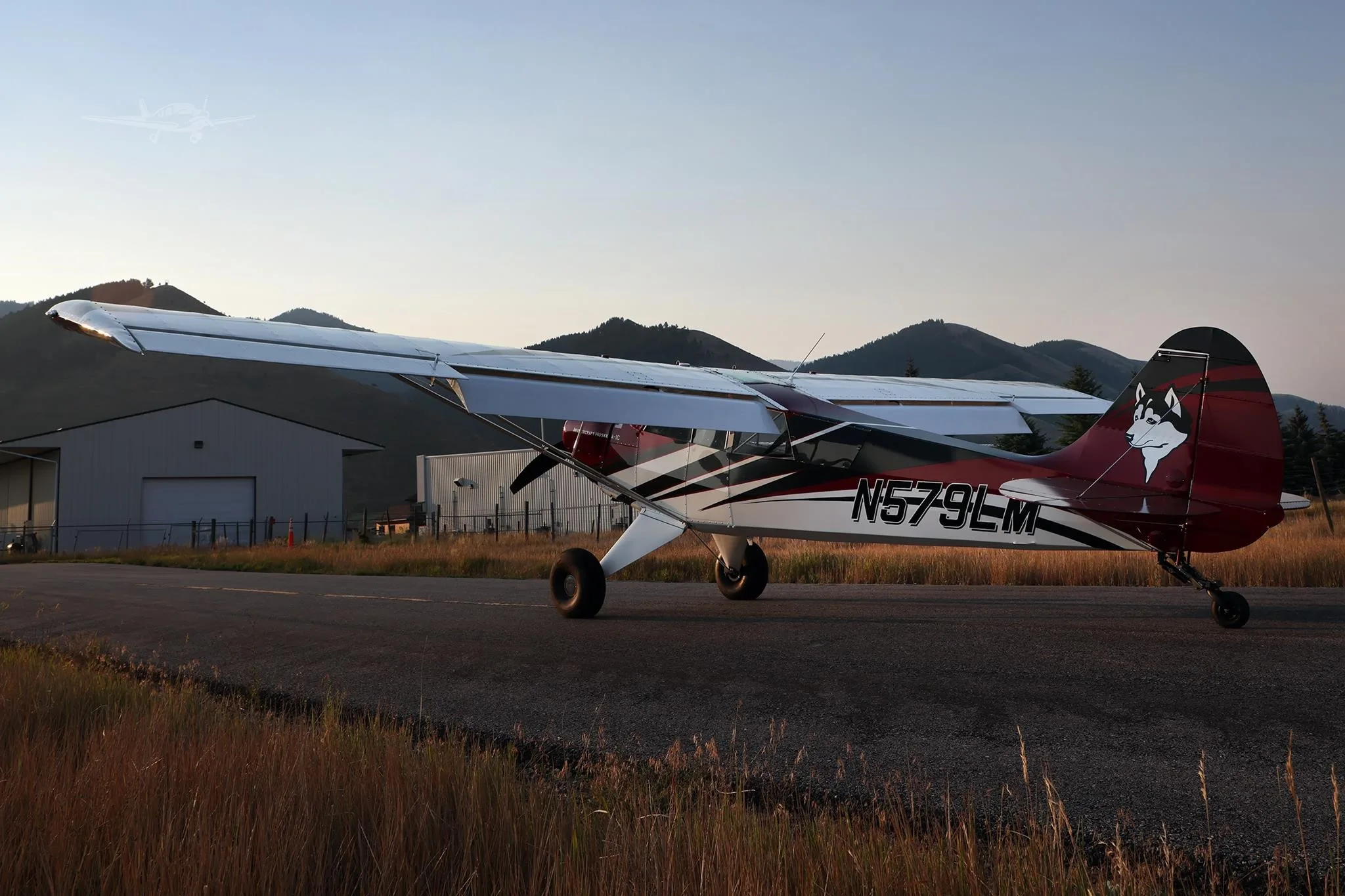 Exterior view of a 2025 AVIAT HUSKY A-1C-200, N579LM.