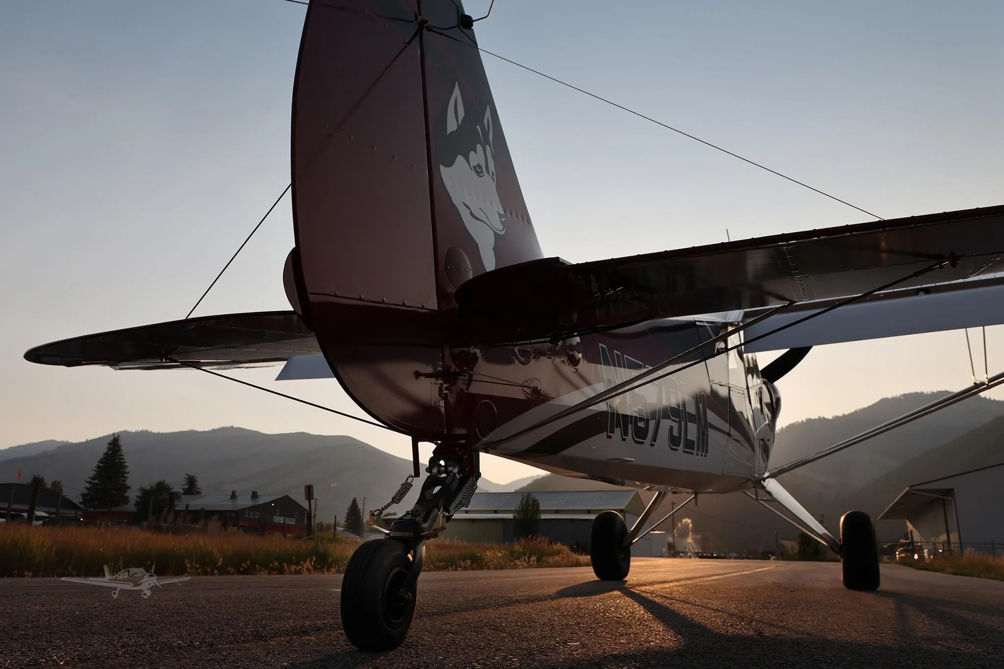 Exterior view of a 2025 AVIAT HUSKY A-1C-200, N579LM.