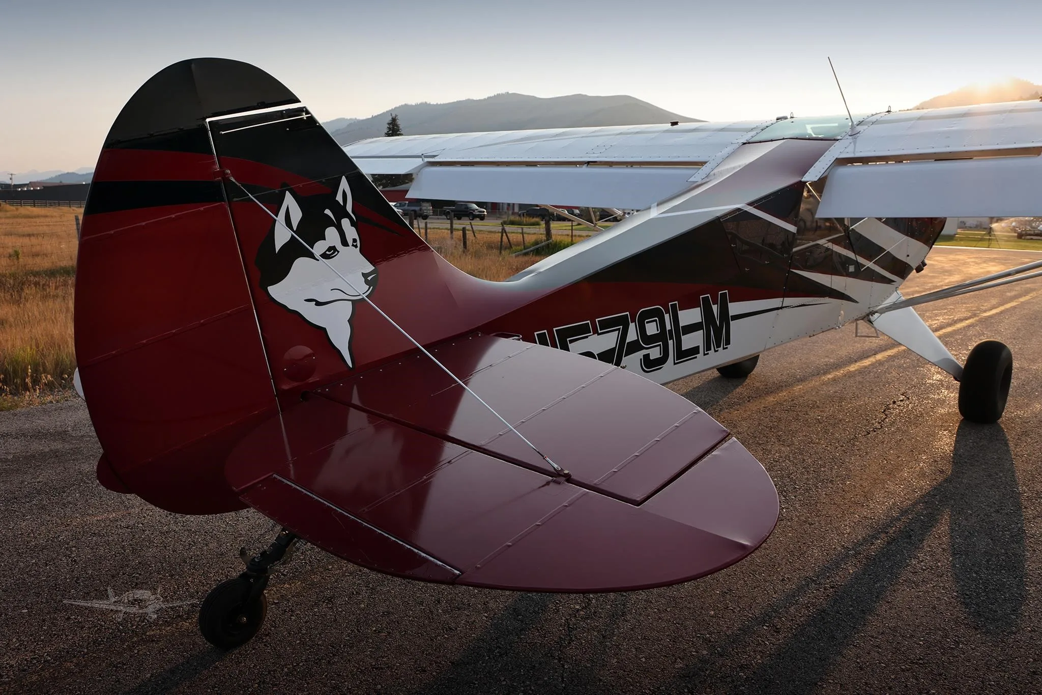 Exterior view of a 2025 AVIAT HUSKY A-1C-200, N579LM.