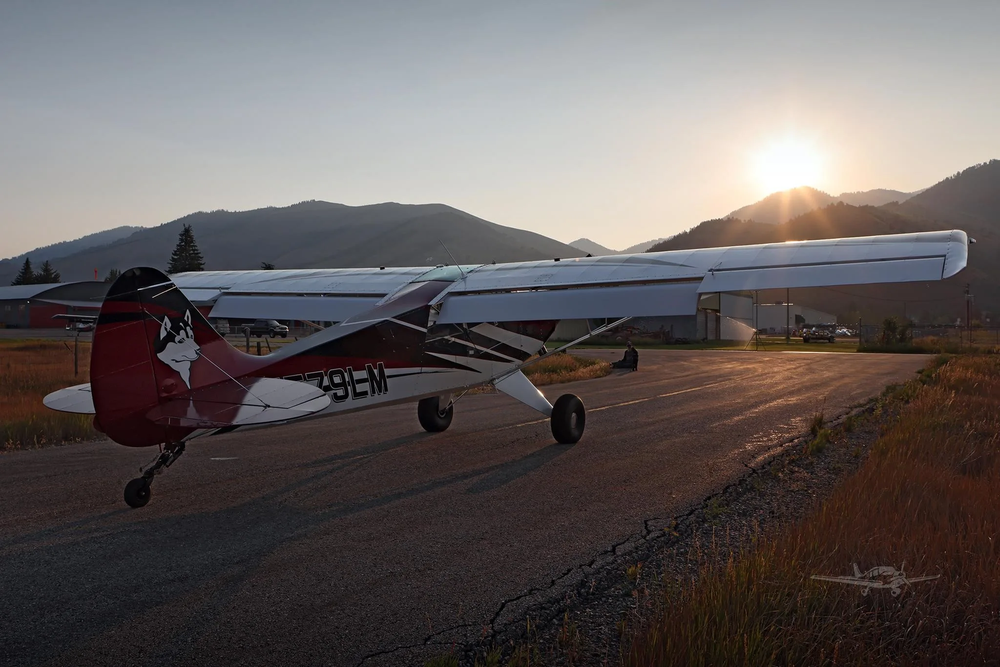Exterior view of a 2025 AVIAT HUSKY A-1C-200, N579LM.