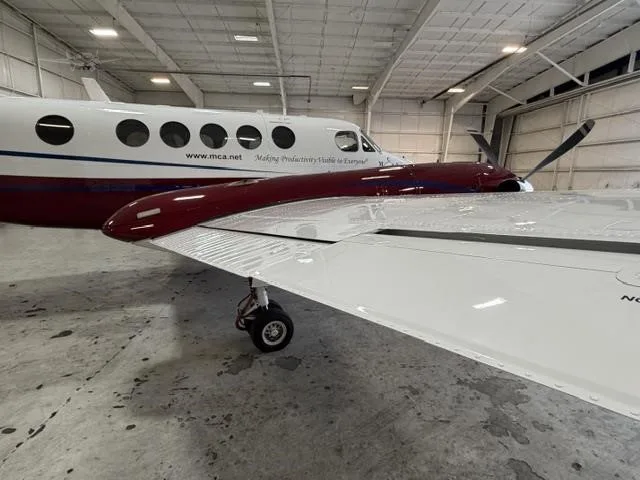 Exterior view of a 2004 BEECHCRAFT KING AIR B200, N597BA.