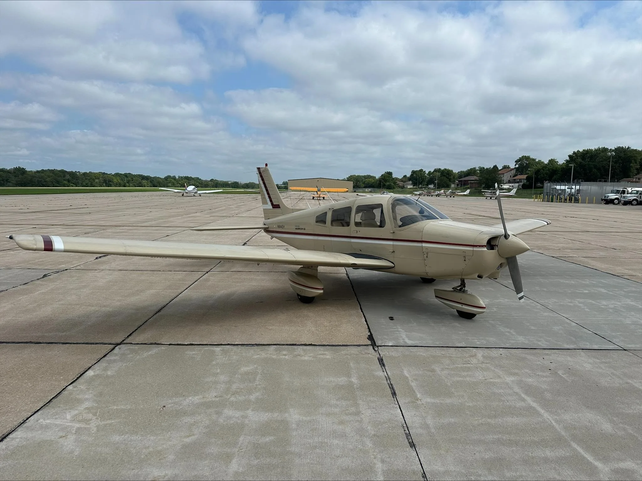 Exterior view of a 1981 PIPER WARRIOR II, N8445H.