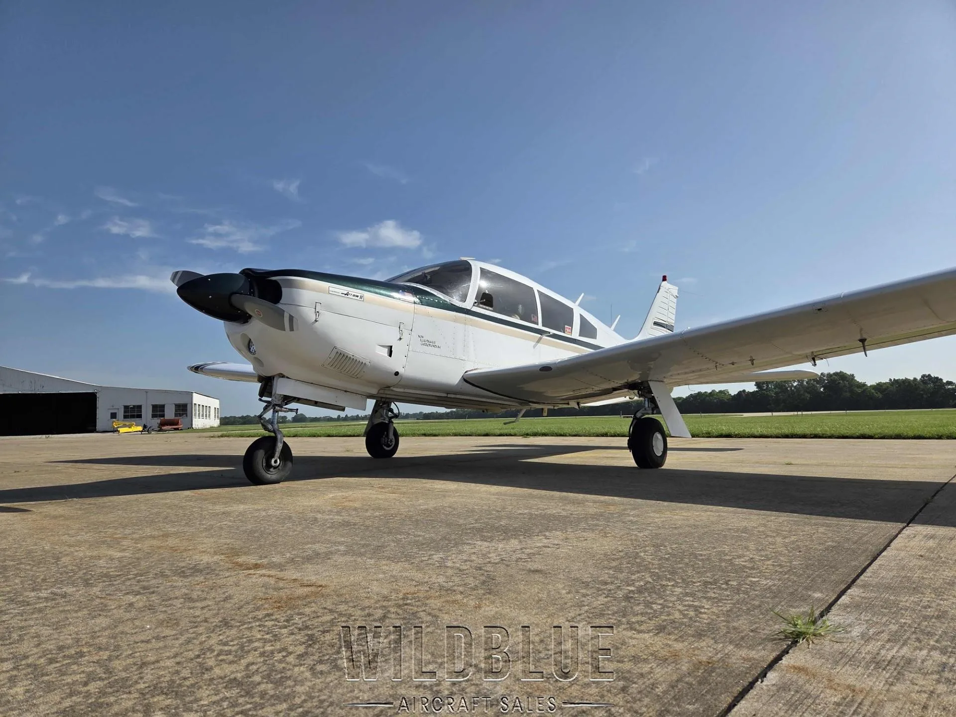 Exterior view of a 1973 PIPER ARROW II, N55116.
