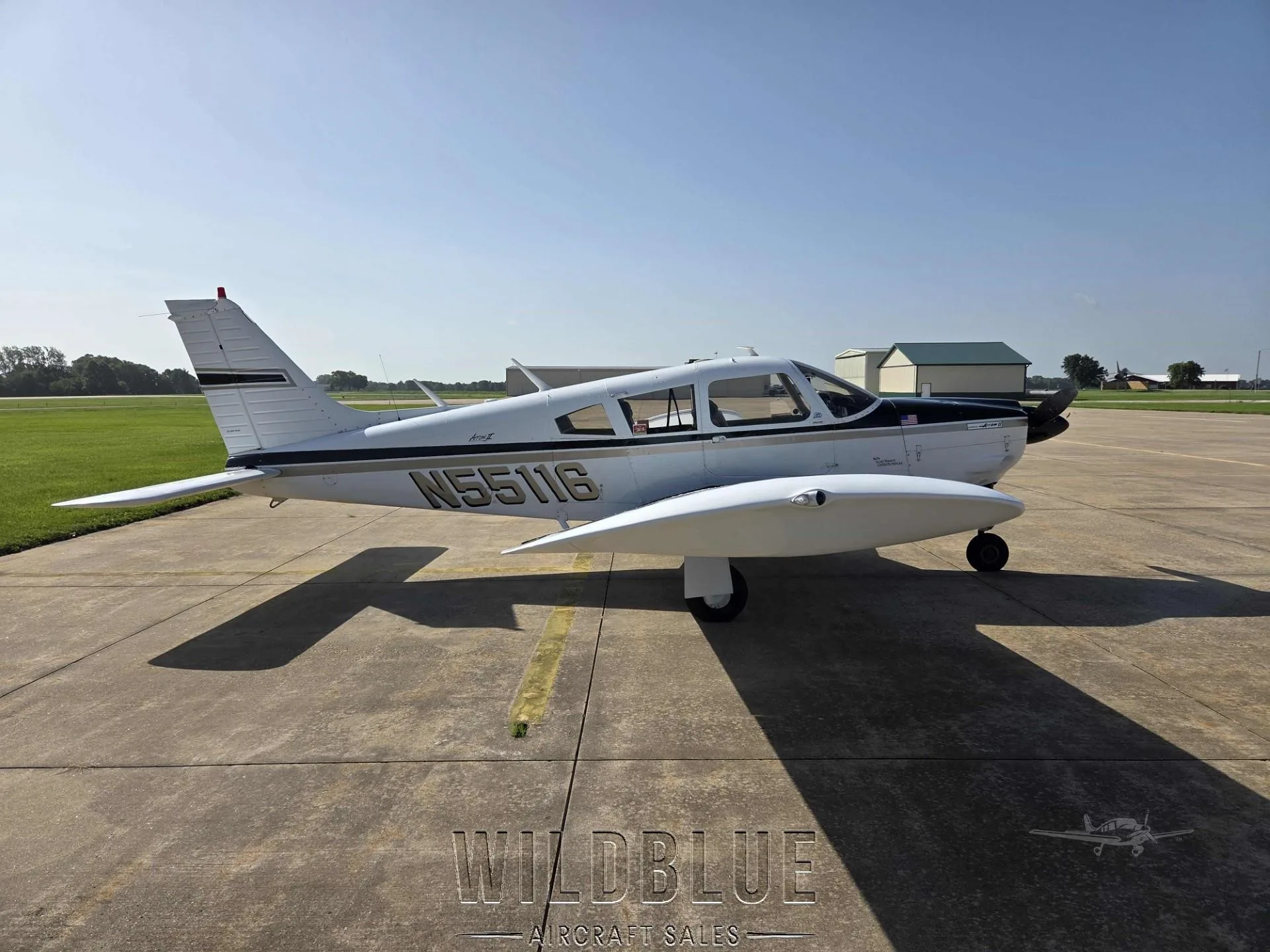 Exterior view of a 1973 PIPER ARROW II, N55116.