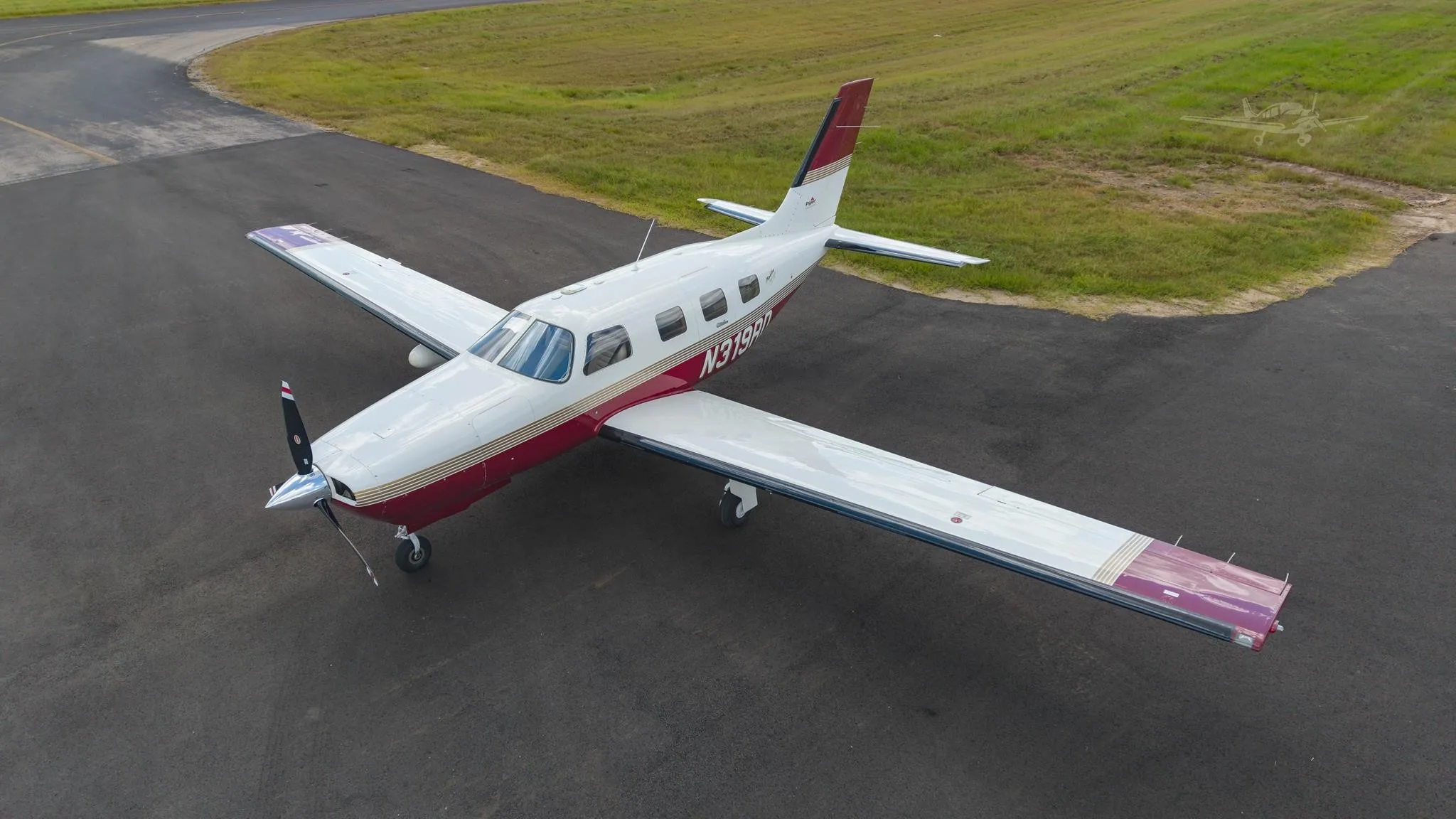 Exterior view of a 1998 PIPER MALIBU MIRAGE, N319RD.