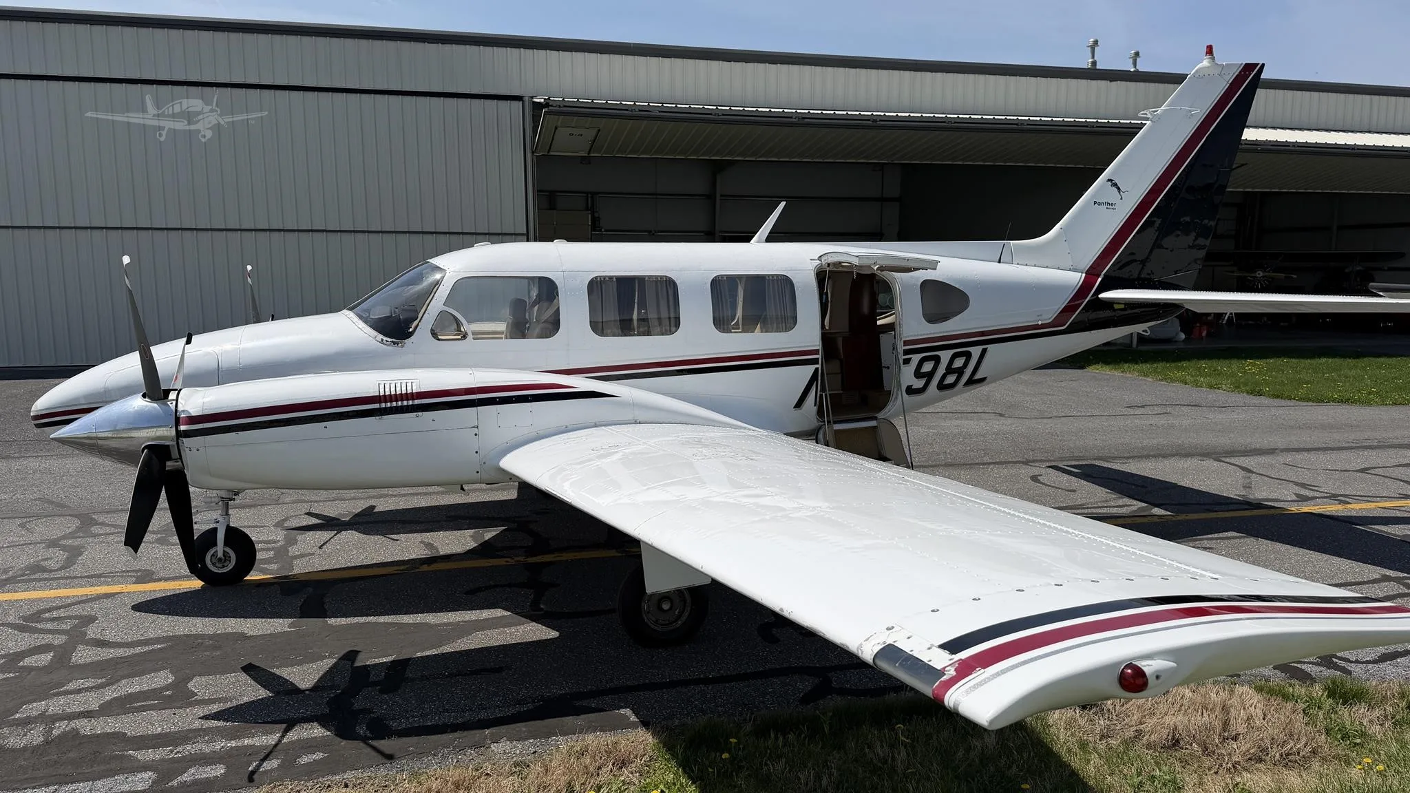 Exterior view of a 1969 PIPER NAVAJO, N6598L.