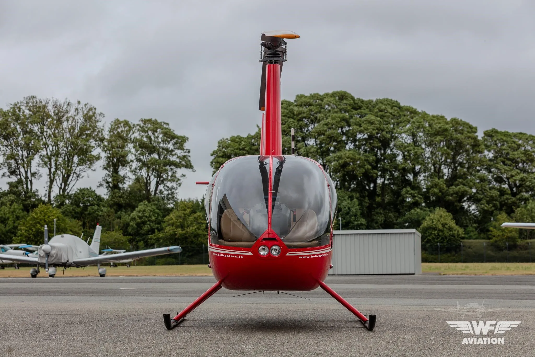 Exterior view of a 2016 ROBINSON R44 RAVEN I, EI-FXL.