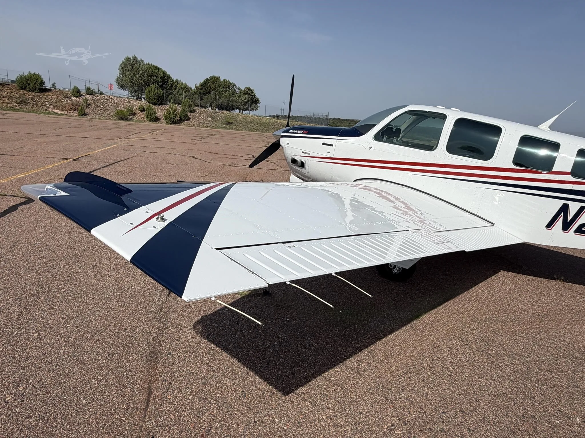 Exterior view of a 1991 BEECHCRAFT A36 BONANZA, N228DM.