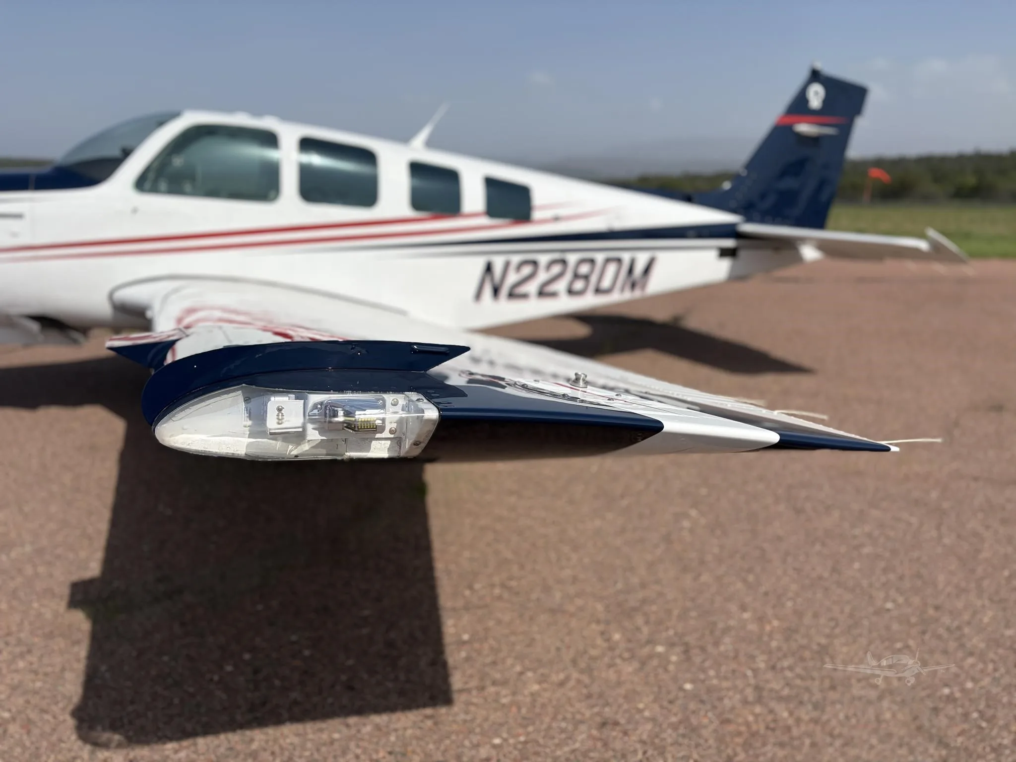 Exterior view of a 1991 BEECHCRAFT A36 BONANZA, N228DM.