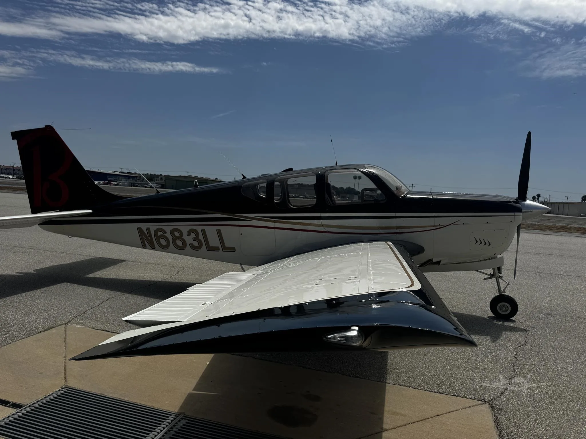 Exterior view of a 1960 BEECHCRAFT 33 DEBONAIR, N683LL.