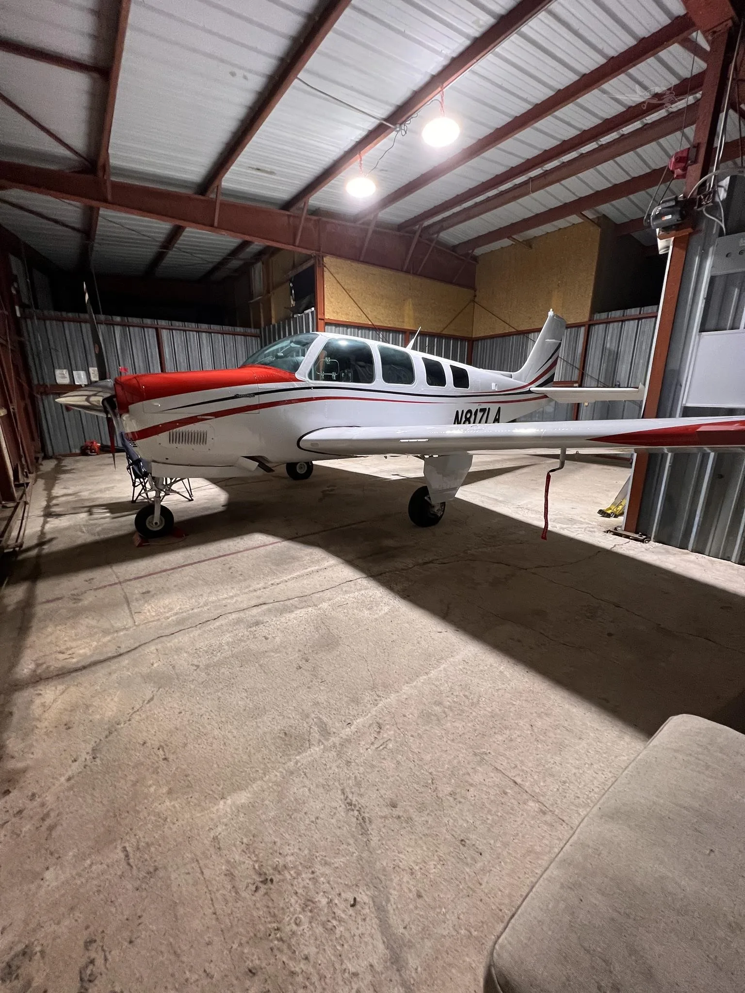 Exterior view of a 1994 BEECHCRAFT A36 BONANZA, N817LA.