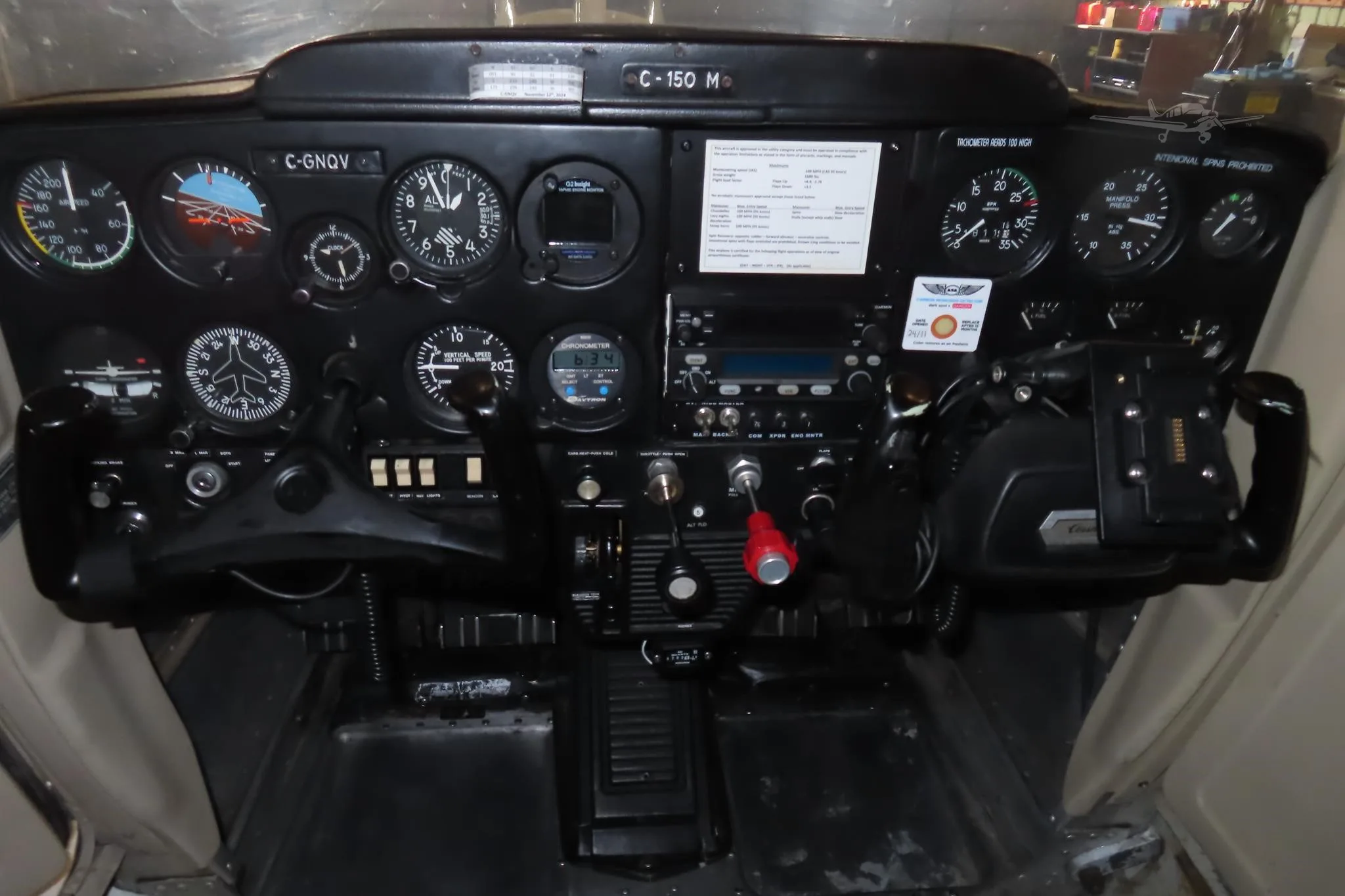 Cockpit and instrument panel of a 1975 CESSNA 150.