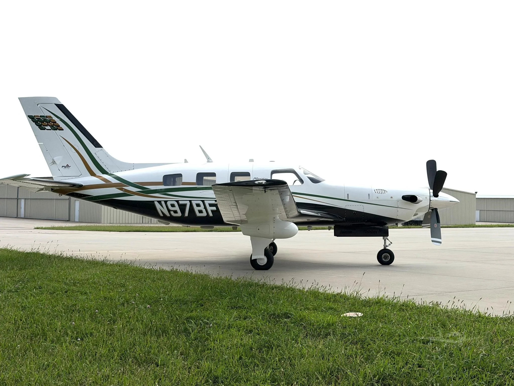 Exterior view of a 2006 PIPER MERIDIAN, N97BF.
