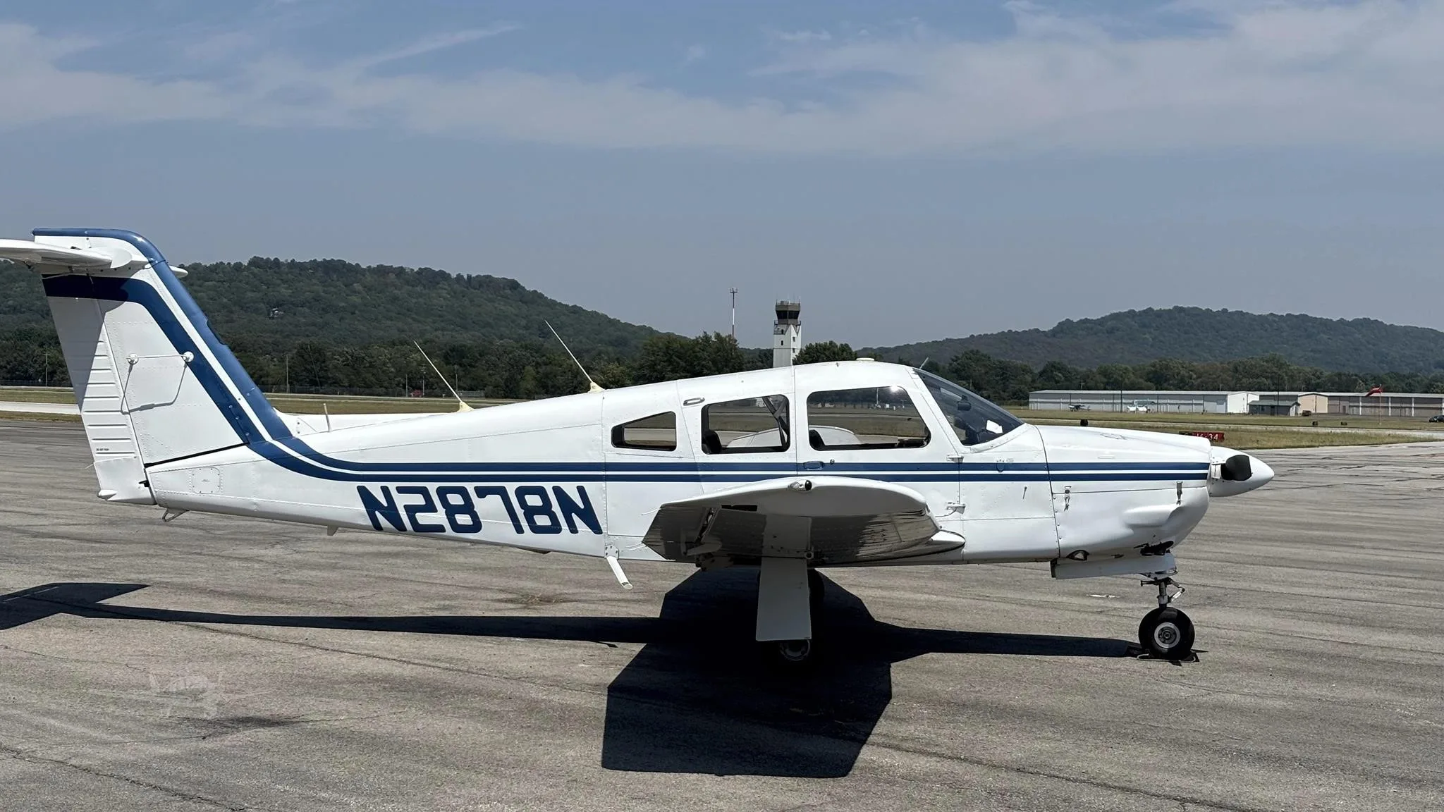 Exterior view of a 1979 PIPER ARROW IV, N2878N.