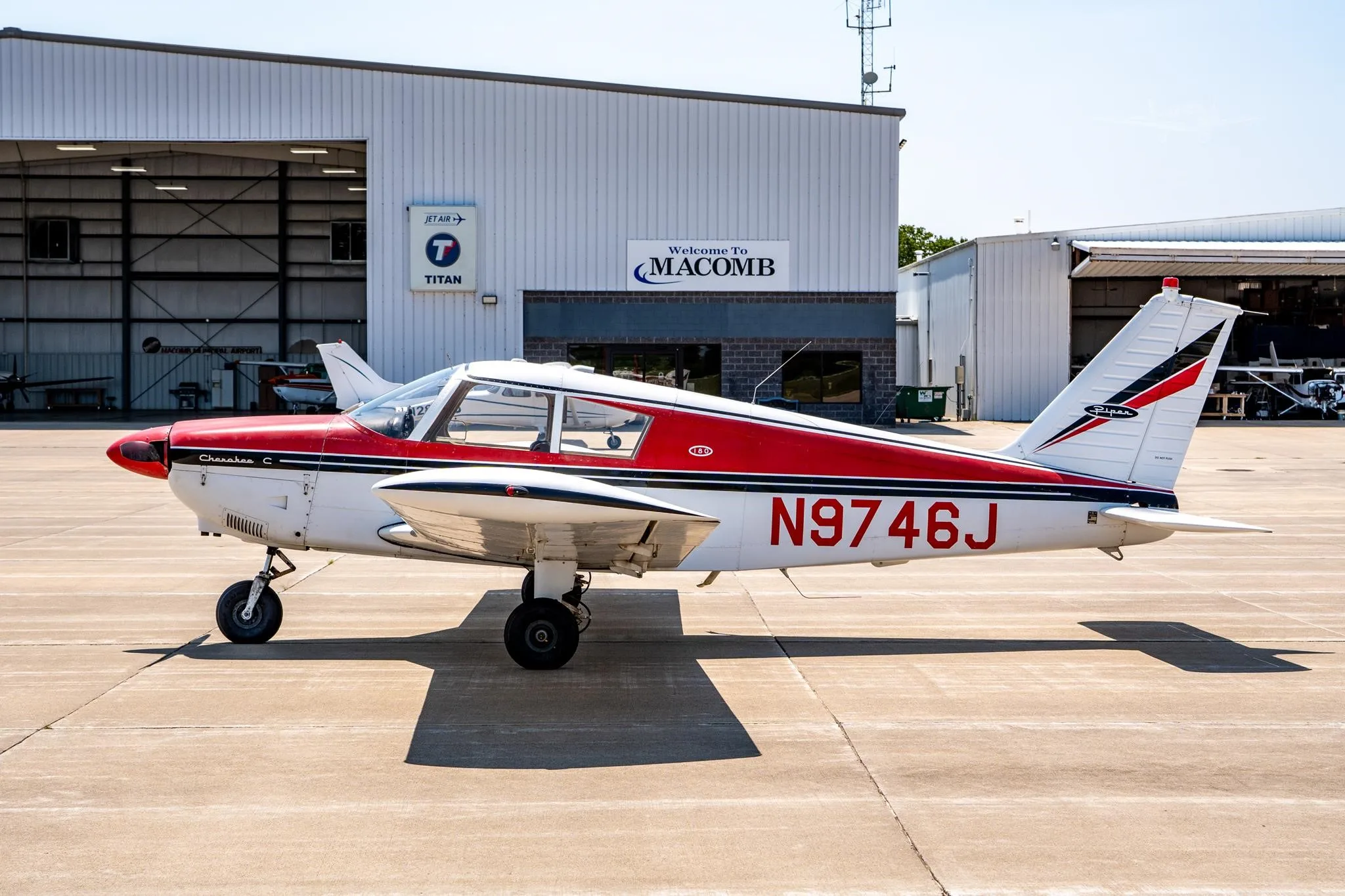Exterior view of a 1967 PIPER CHEROKEE 180, N9746J.