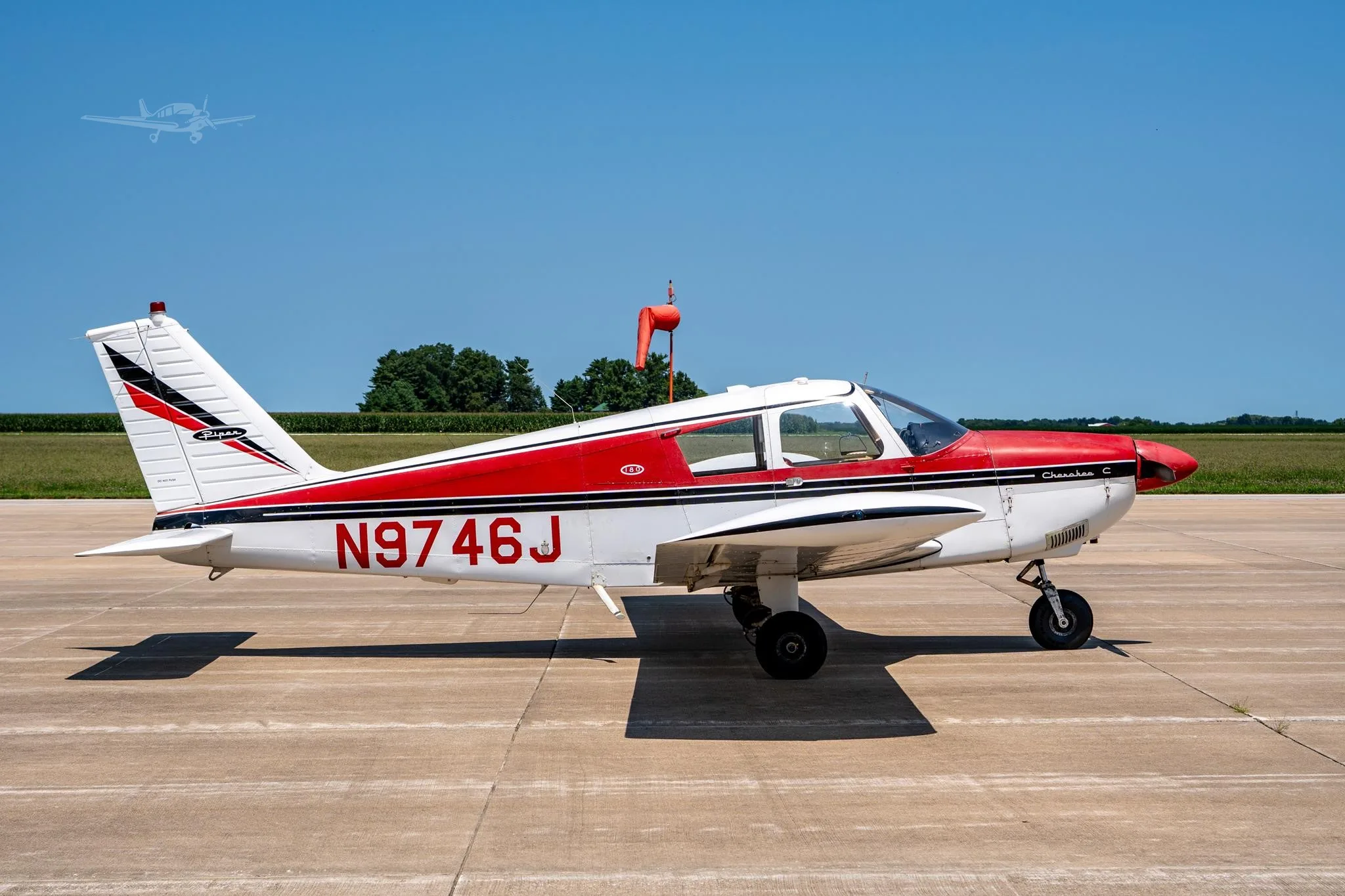 Exterior view of a 1967 PIPER CHEROKEE 180, N9746J.