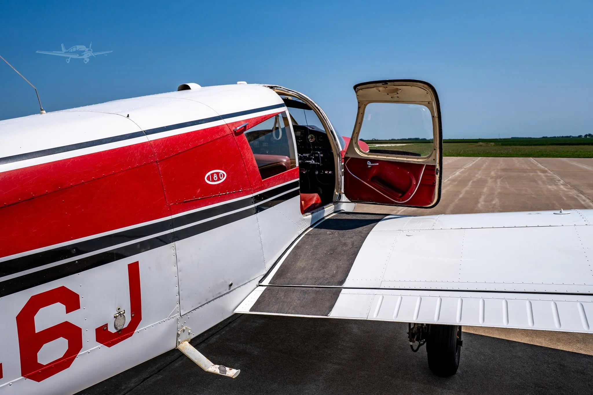 Exterior view of a 1967 PIPER CHEROKEE 180, N9746J.