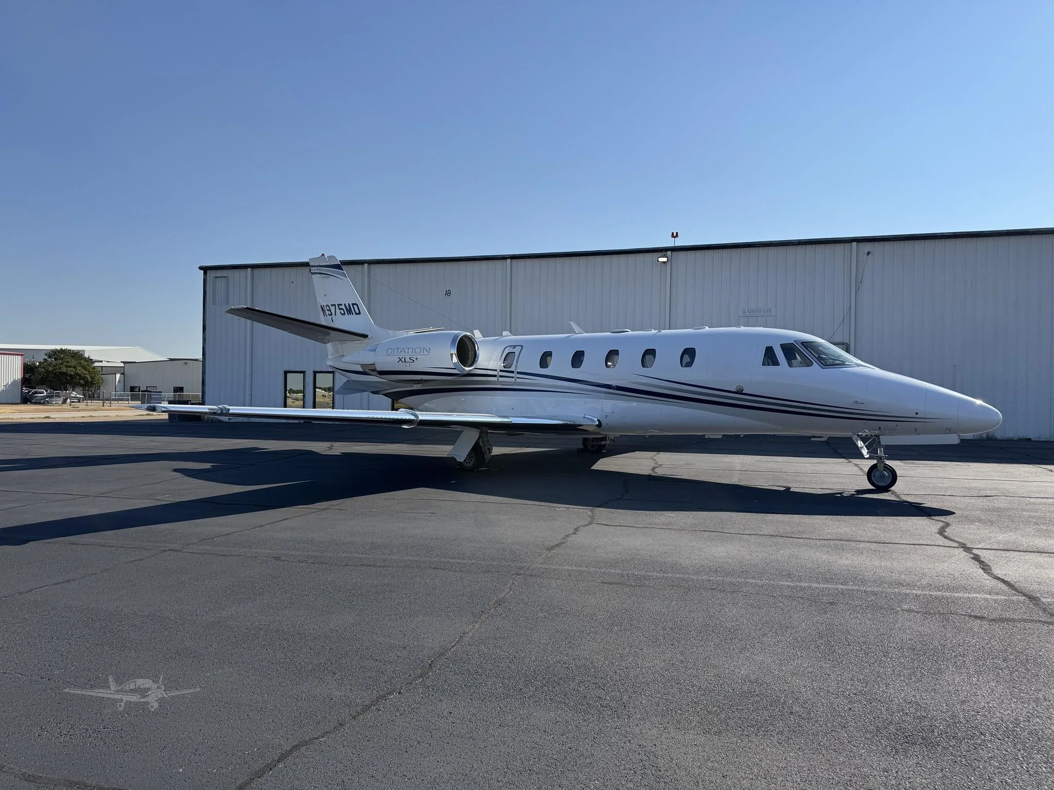 Exterior view of a 2011 CESSNA CITATION XLS+, N975MD.