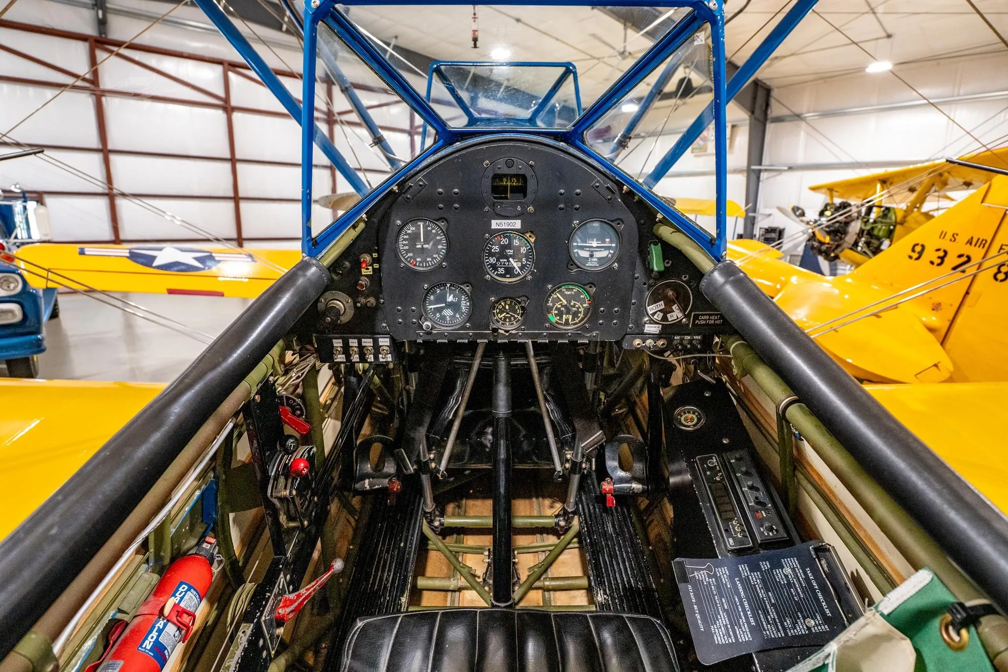 Cockpit and instrument panel of a 1940 BOEING/STEARMAN PT-18 KAYDET.
