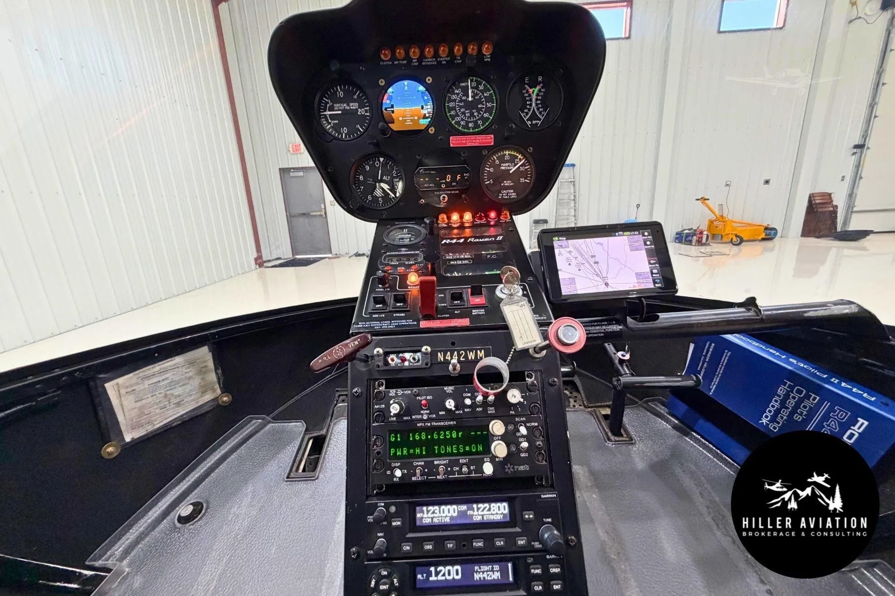 Cockpit and instrument panel of a 2006 ROBINSON R44 RAVEN II.