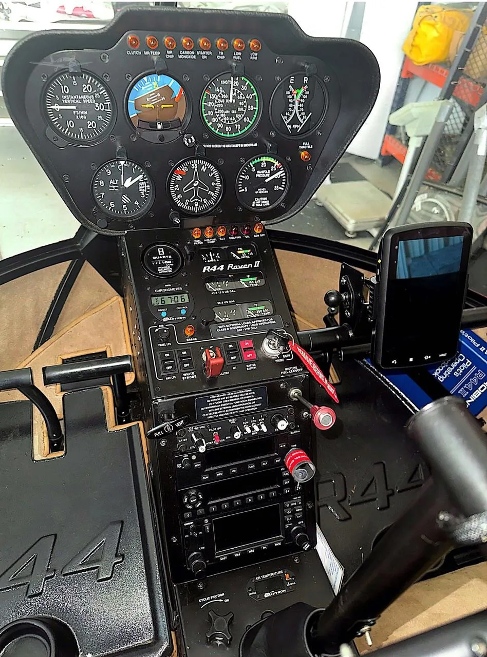 Cockpit and instrument panel of a 2012 ROBINSON R44 RAVEN II.