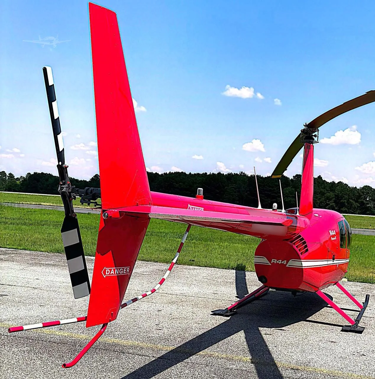 Exterior view of a 2012 ROBINSON R44 RAVEN II.