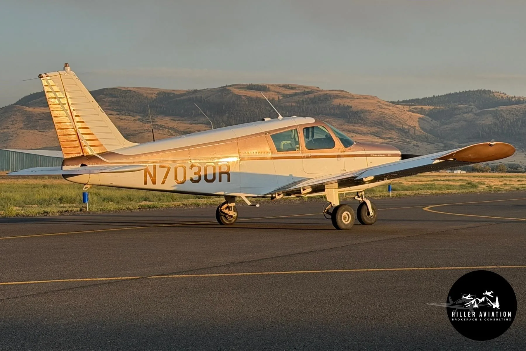 Exterior view of a 1966 PIPER CHEROKEE 140, N7030R.