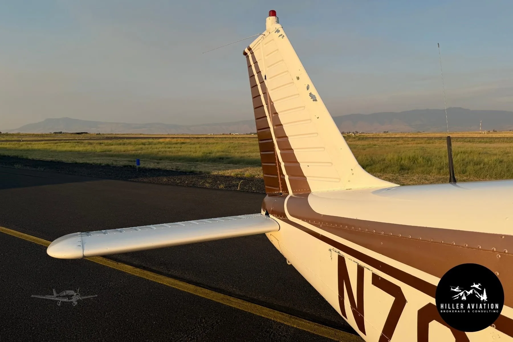 Exterior view of a 1966 PIPER CHEROKEE 140, N7030R.