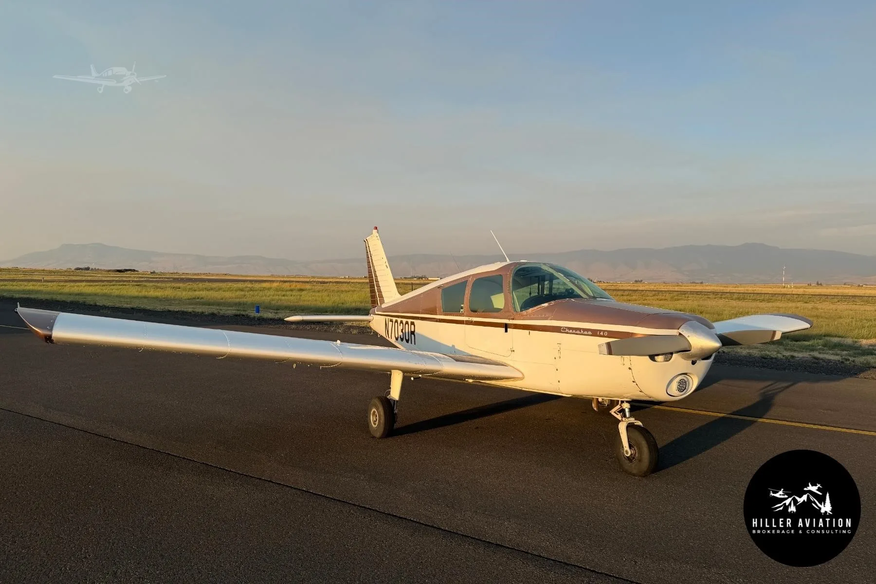 Exterior view of a 1966 PIPER CHEROKEE 140, N7030R.