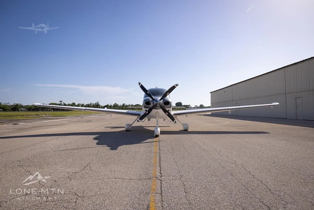 Exterior view of a 2023 CIRRUS SR22-G6 TURBO, N166BG.