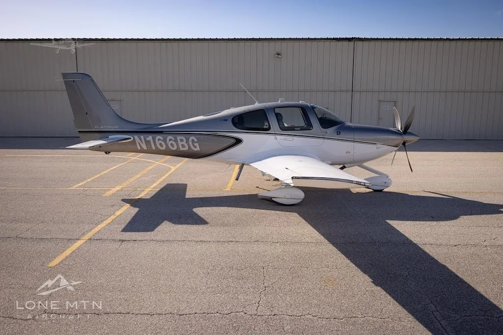 Exterior view of a 2023 CIRRUS SR22-G6 TURBO, N166BG.