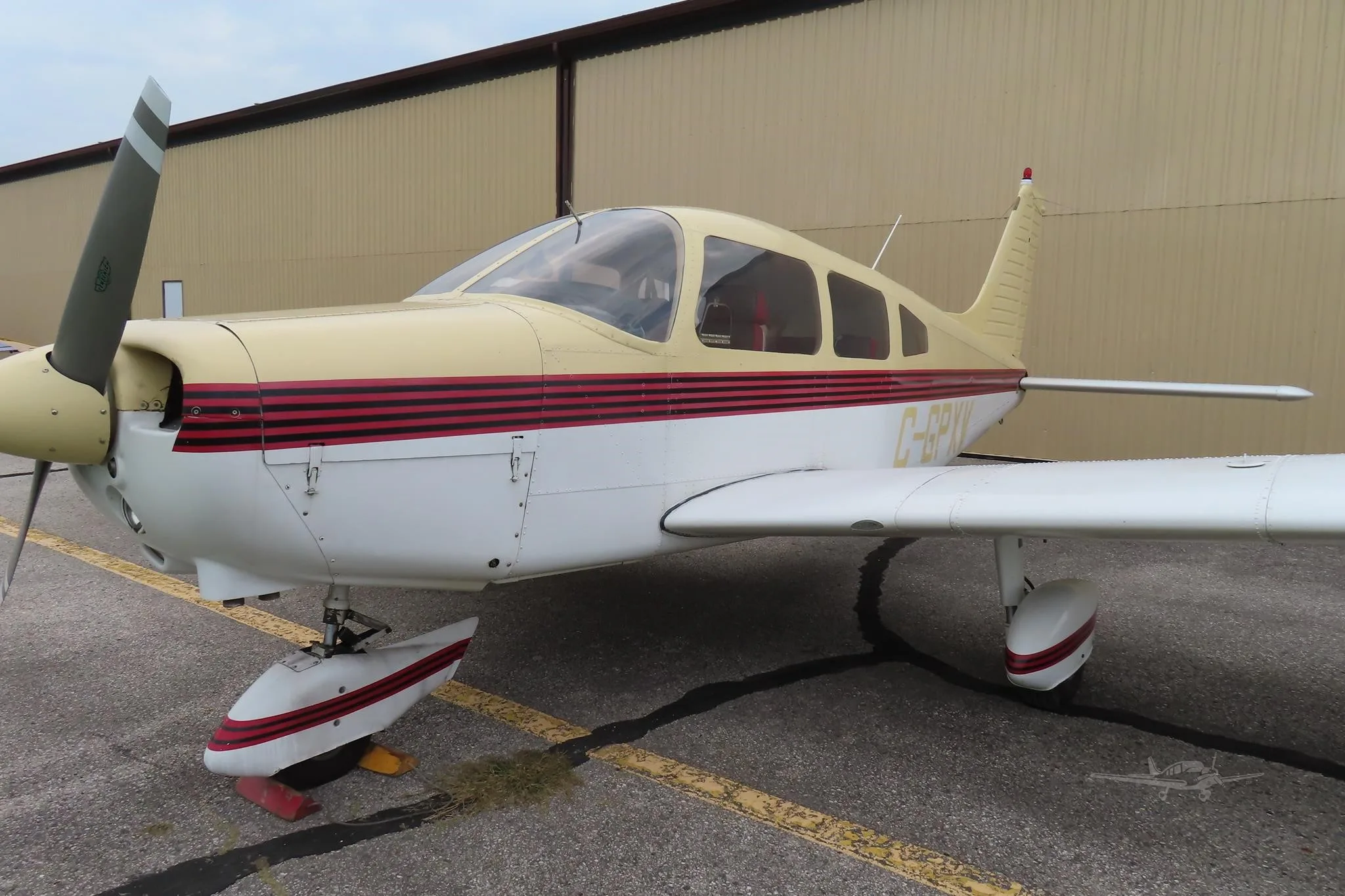 Exterior view of a 1976 PIPER WARRIOR, C-GPXV.
