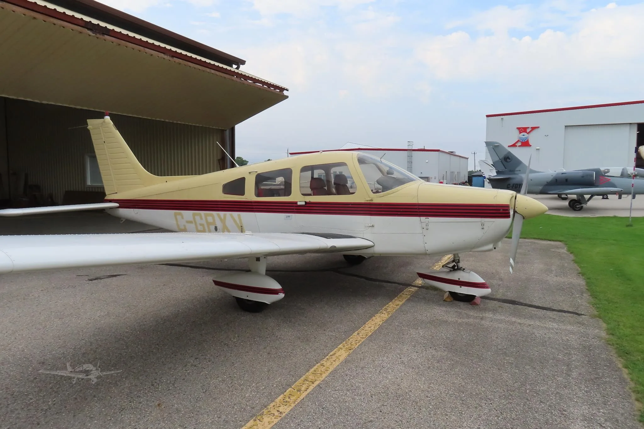 Exterior view of a 1976 PIPER WARRIOR, C-GPXV.