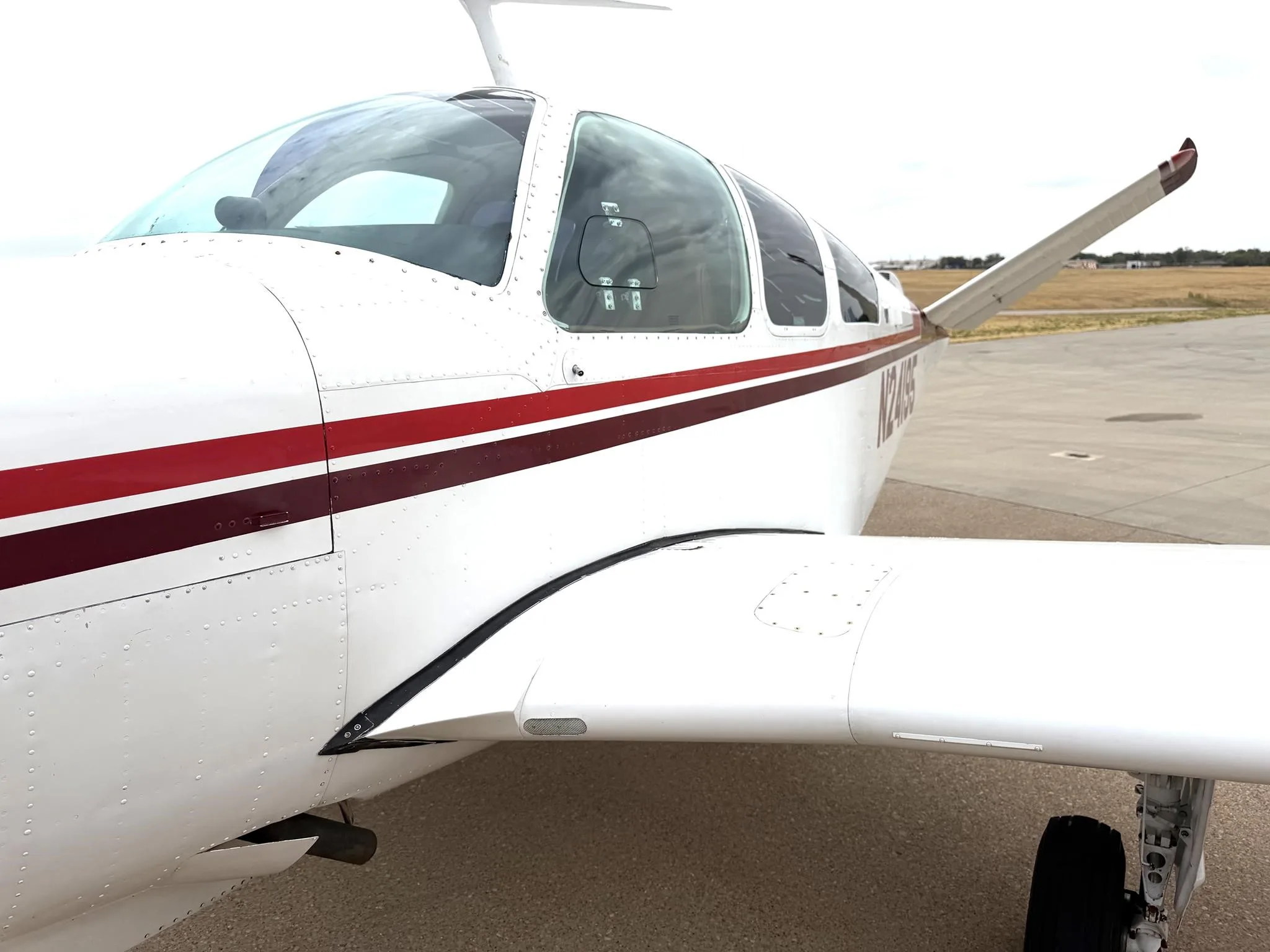 Exterior view of a 1978 BEECHCRAFT V35B BONANZA, N21495.
