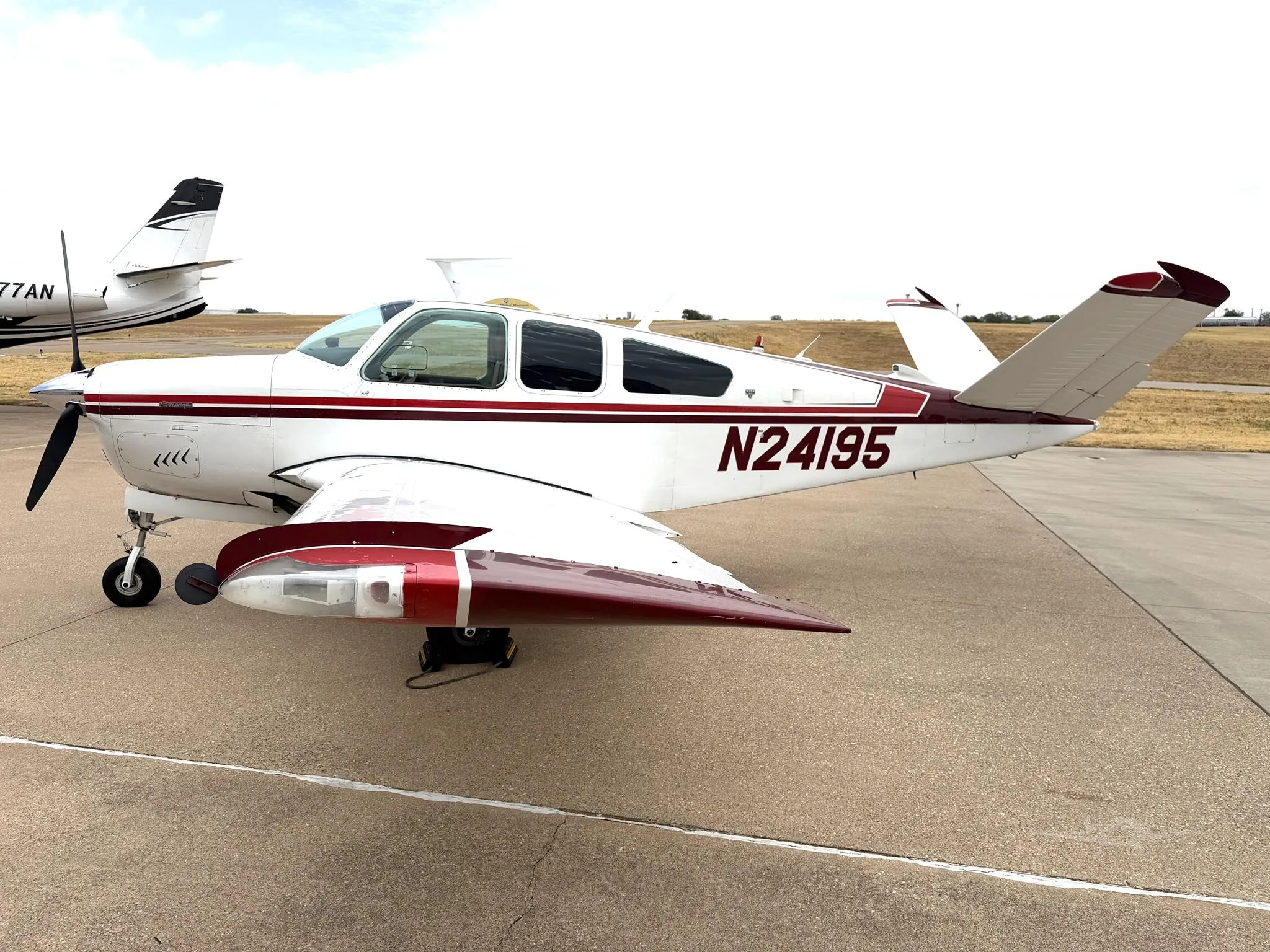 Exterior view of a 1978 BEECHCRAFT V35B BONANZA, N21495.