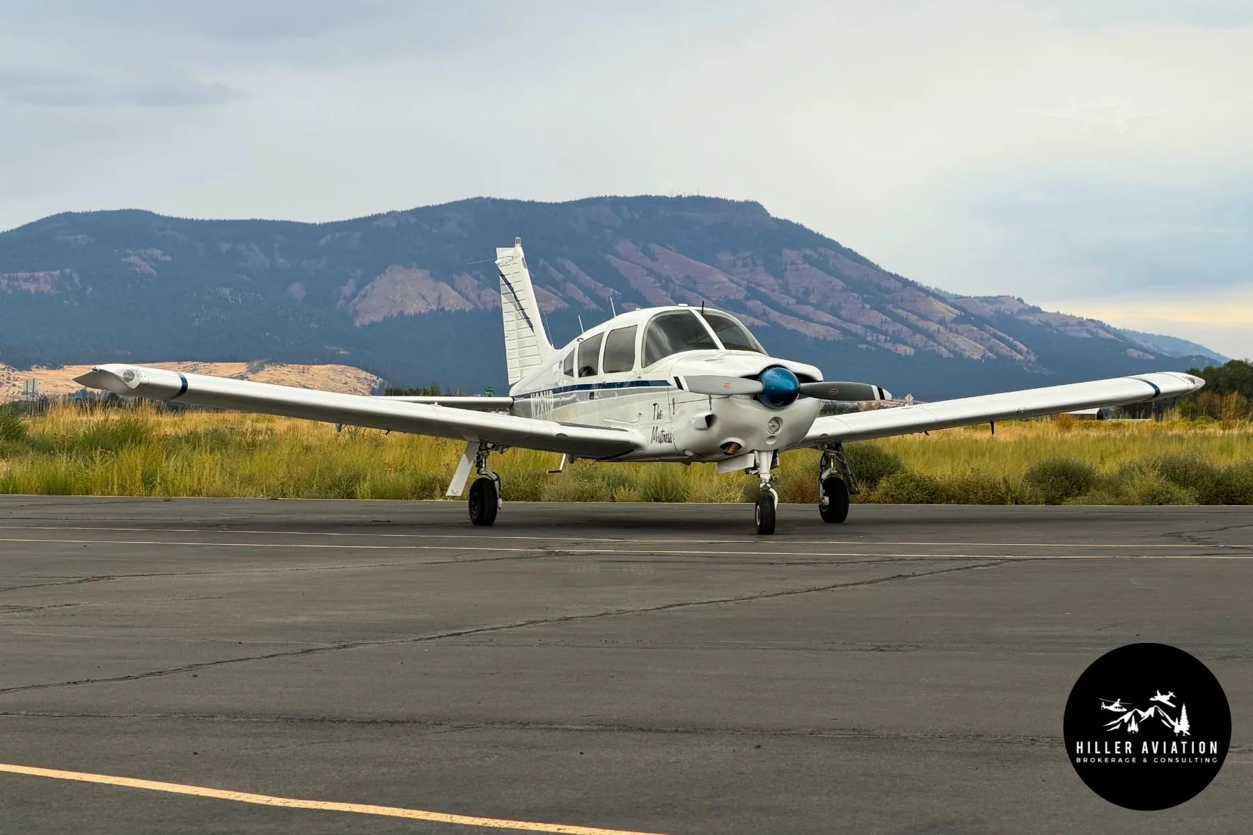 Exterior view of a 1973 PIPER ARROW II, N28UP.