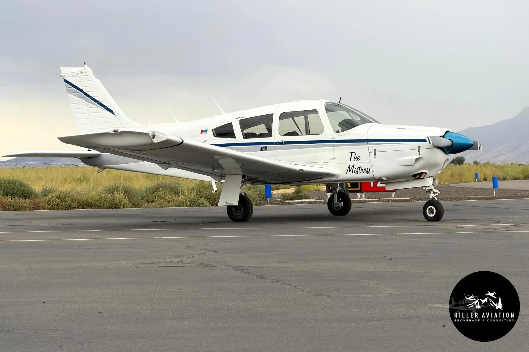 Exterior view of a 1973 PIPER ARROW II, N28UP.