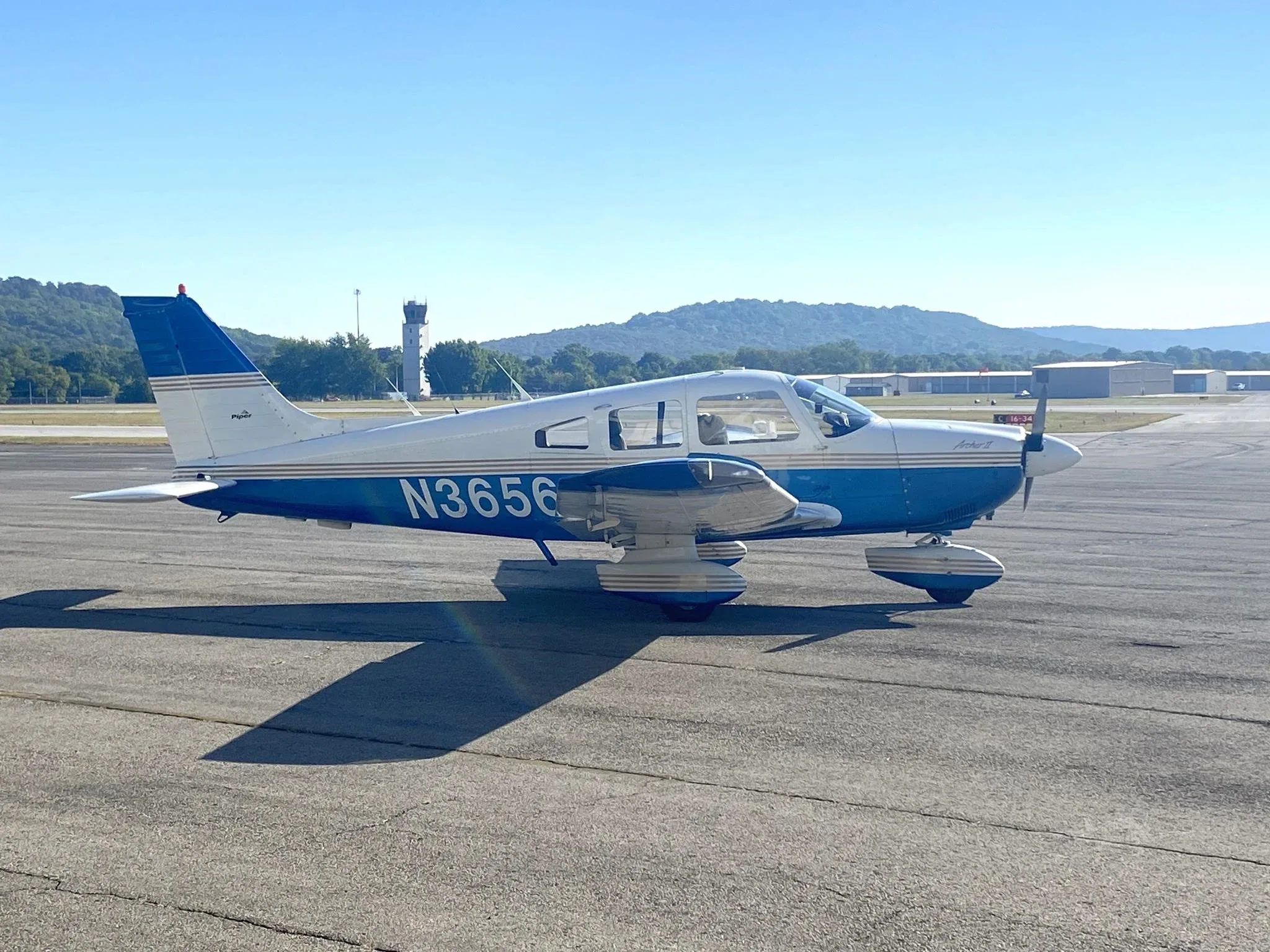 Exterior view of a 1978 PIPER ARCHER II, N36563.