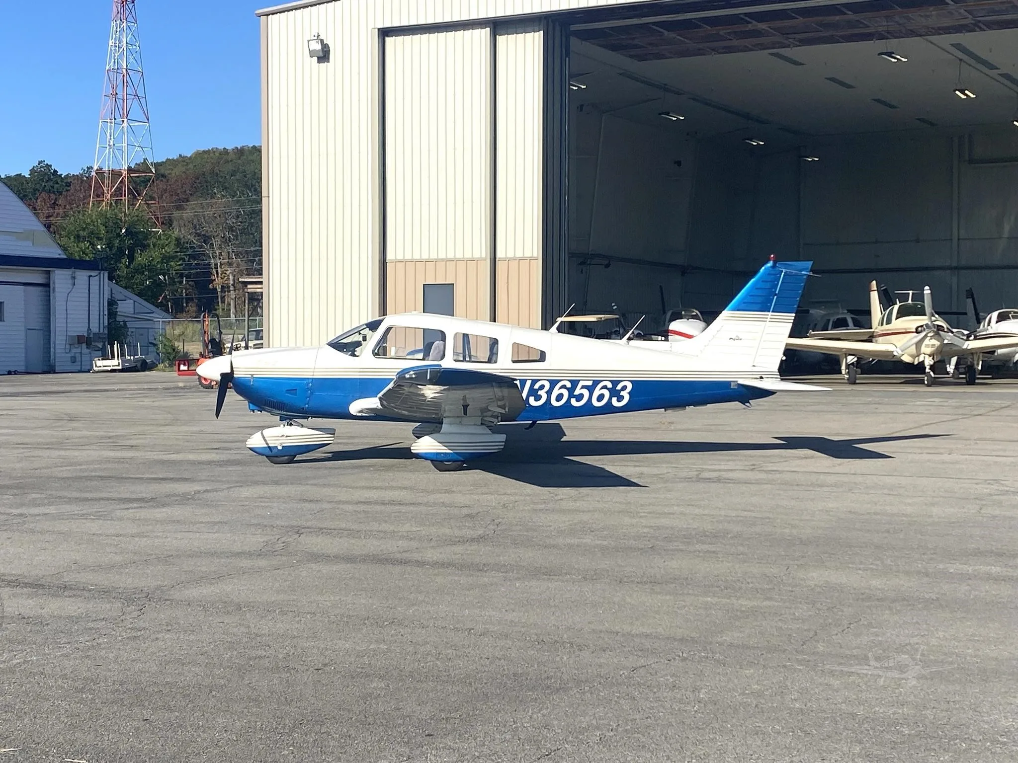 Exterior view of a 1978 PIPER ARCHER II, N36563.