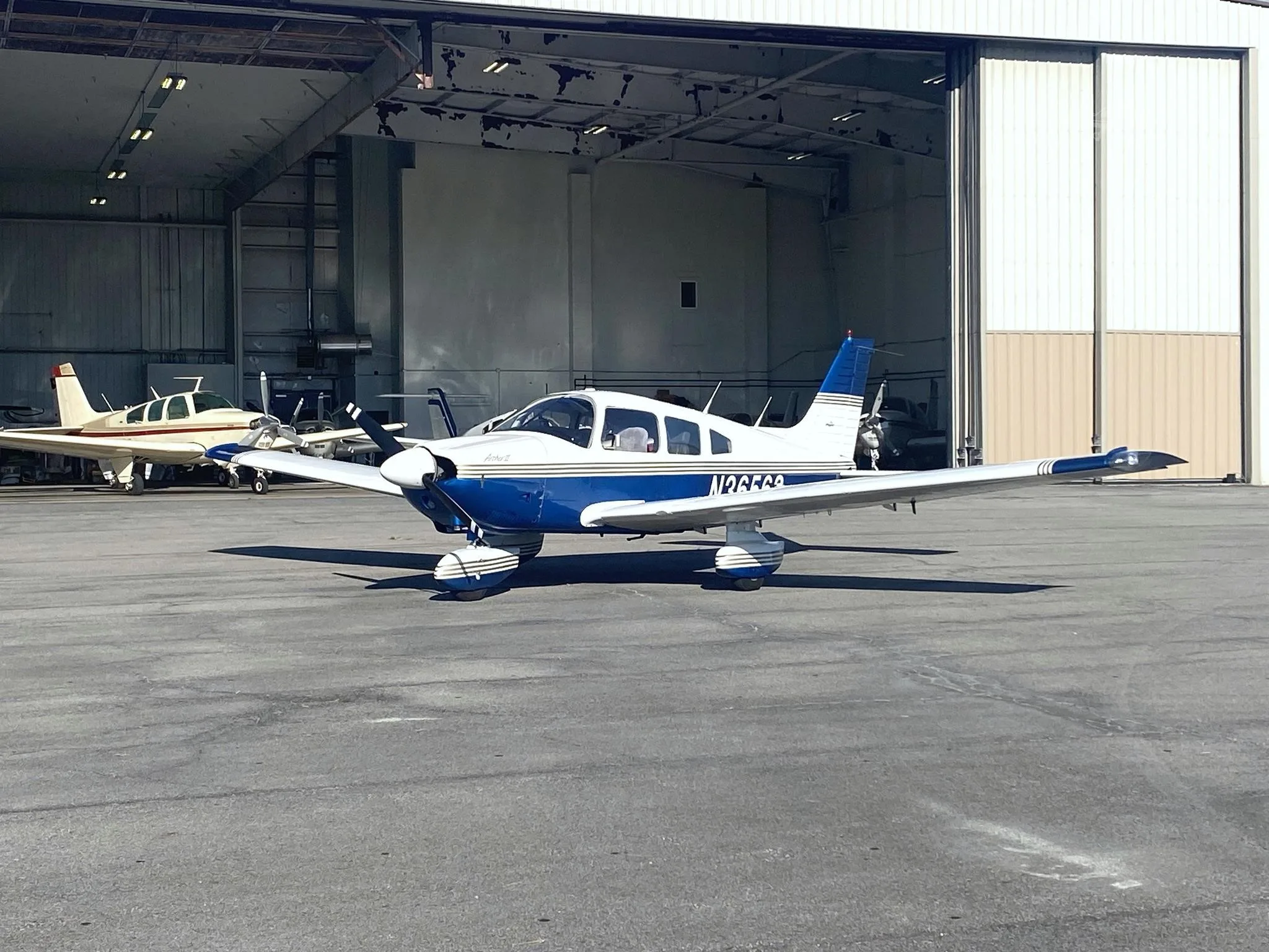 Exterior view of a 1978 PIPER ARCHER II, N36563.