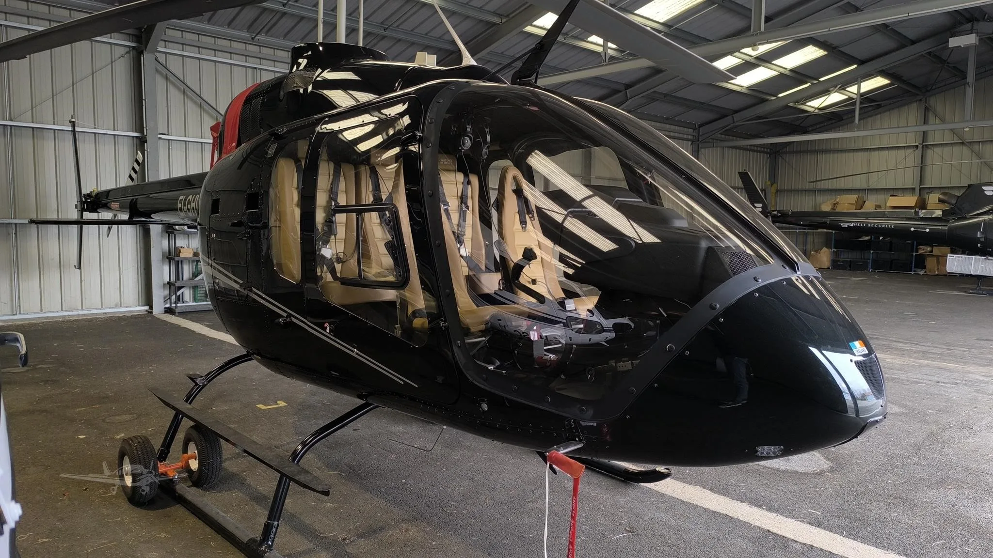 Exterior view of a 2018 BELL 505 JET RANGER X, EI-GHW.
